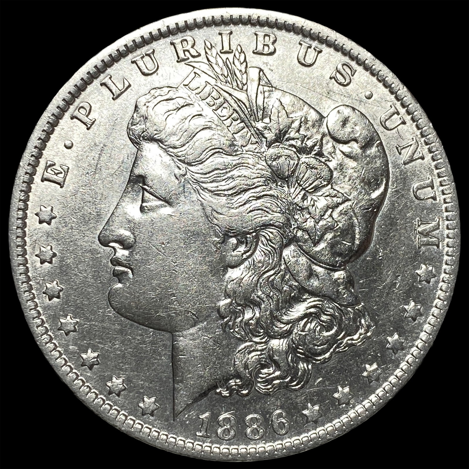 1886-O Silver Morgan Dollar CLOSELY UNCIRCULATED: 1886-O Silver Morgan Dollar CLOSELY UNCIRCULATED