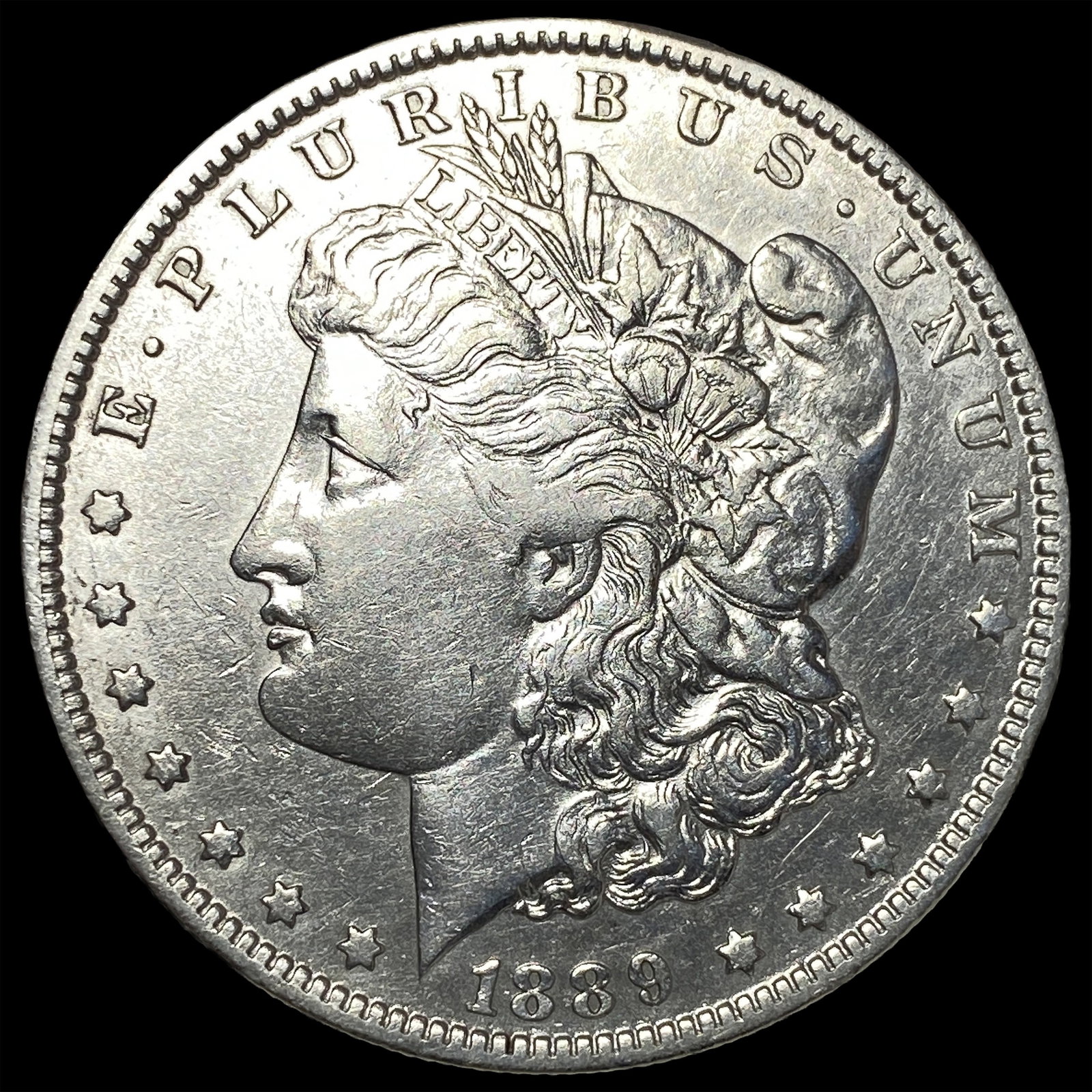 1889-O Silver Morgan Dollar ABOUT UNCIRCULATED: 1889-O Silver Morgan Dollar ABOUT UNCIRCULATED