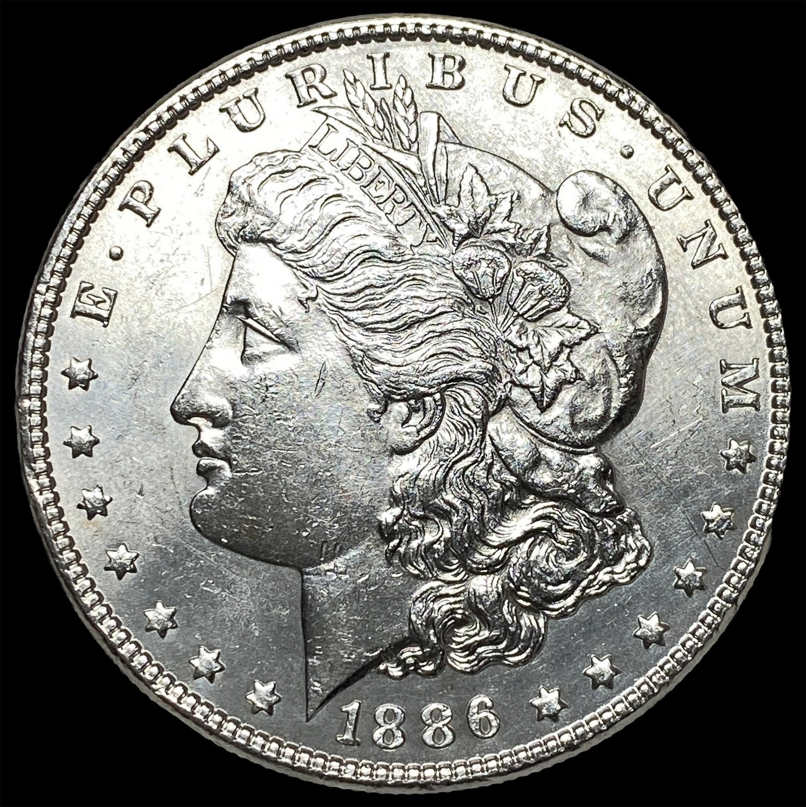 1886 Silver Morgan Dollar CLOSELY UNCIRCULATED: 1886 Silver Morgan Dollar CLOSELY UNCIRCULATED