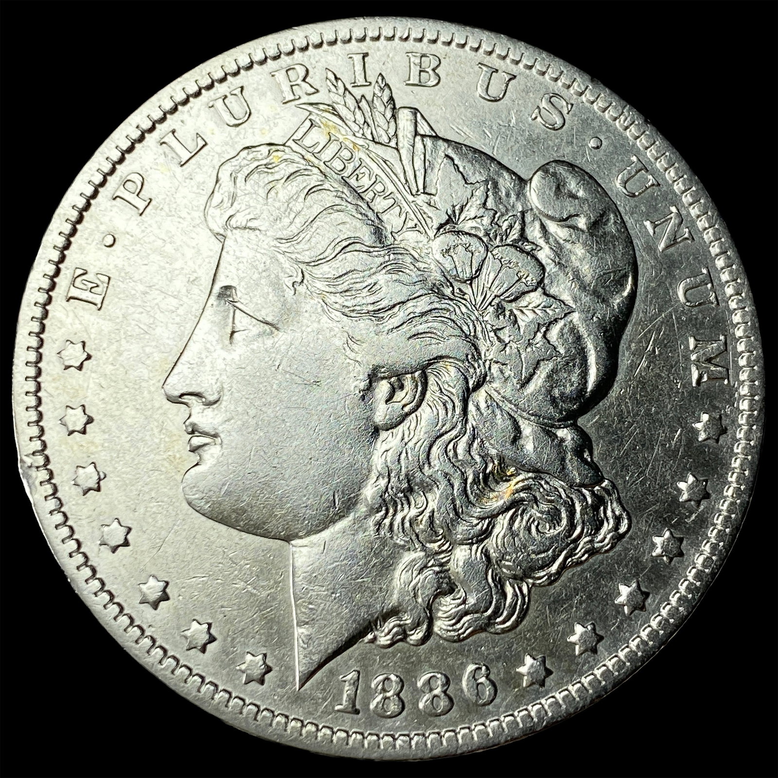 1886-O Silver Morgan Dollar ABOUT UNCIRCULATED: 1886-O Silver Morgan Dollar ABOUT UNCIRCULATED