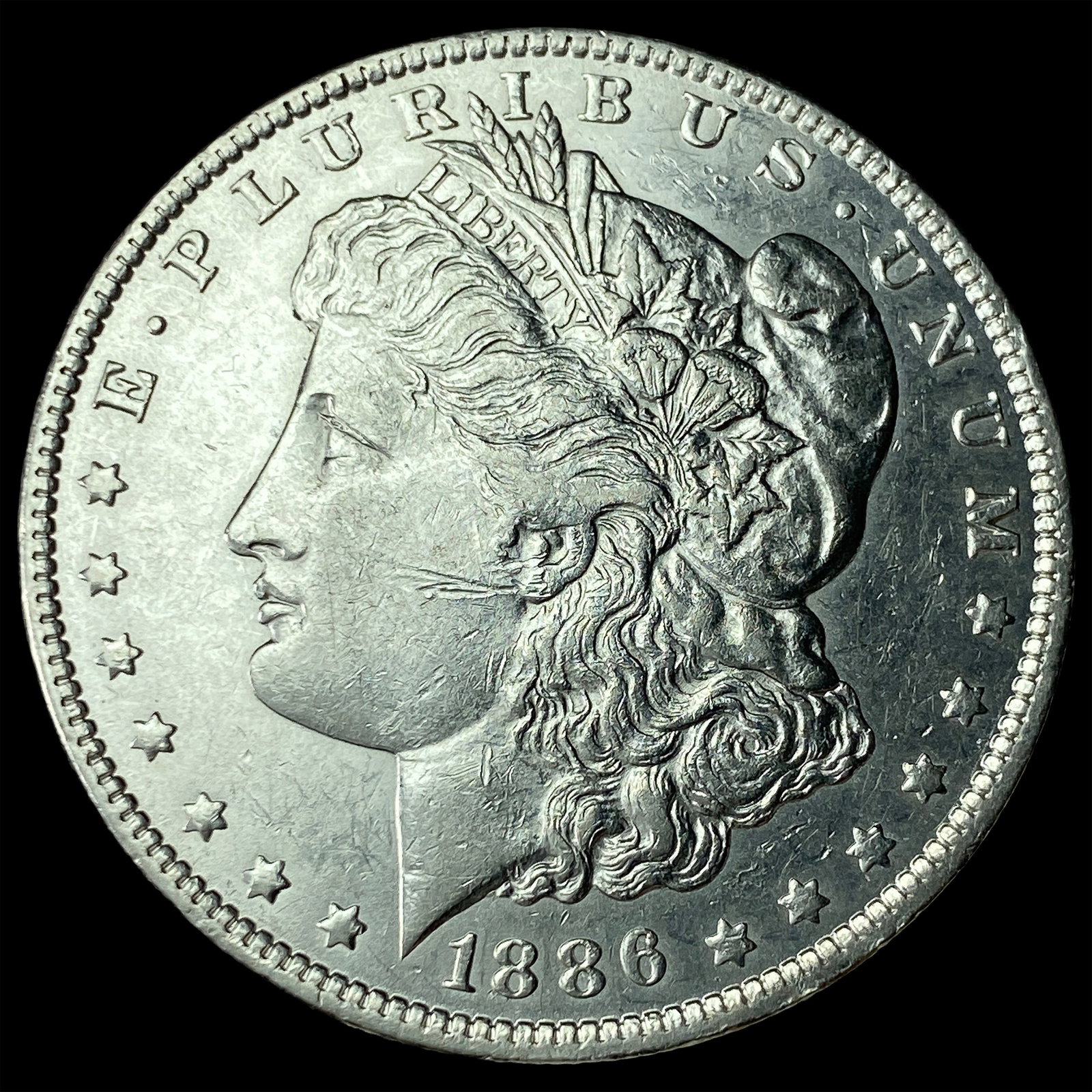 1886-O Silver Morgan Dollar CLOSELY UNCIRCULATED: 1886-O Silver Morgan Dollar CLOSELY UNCIRCULATED