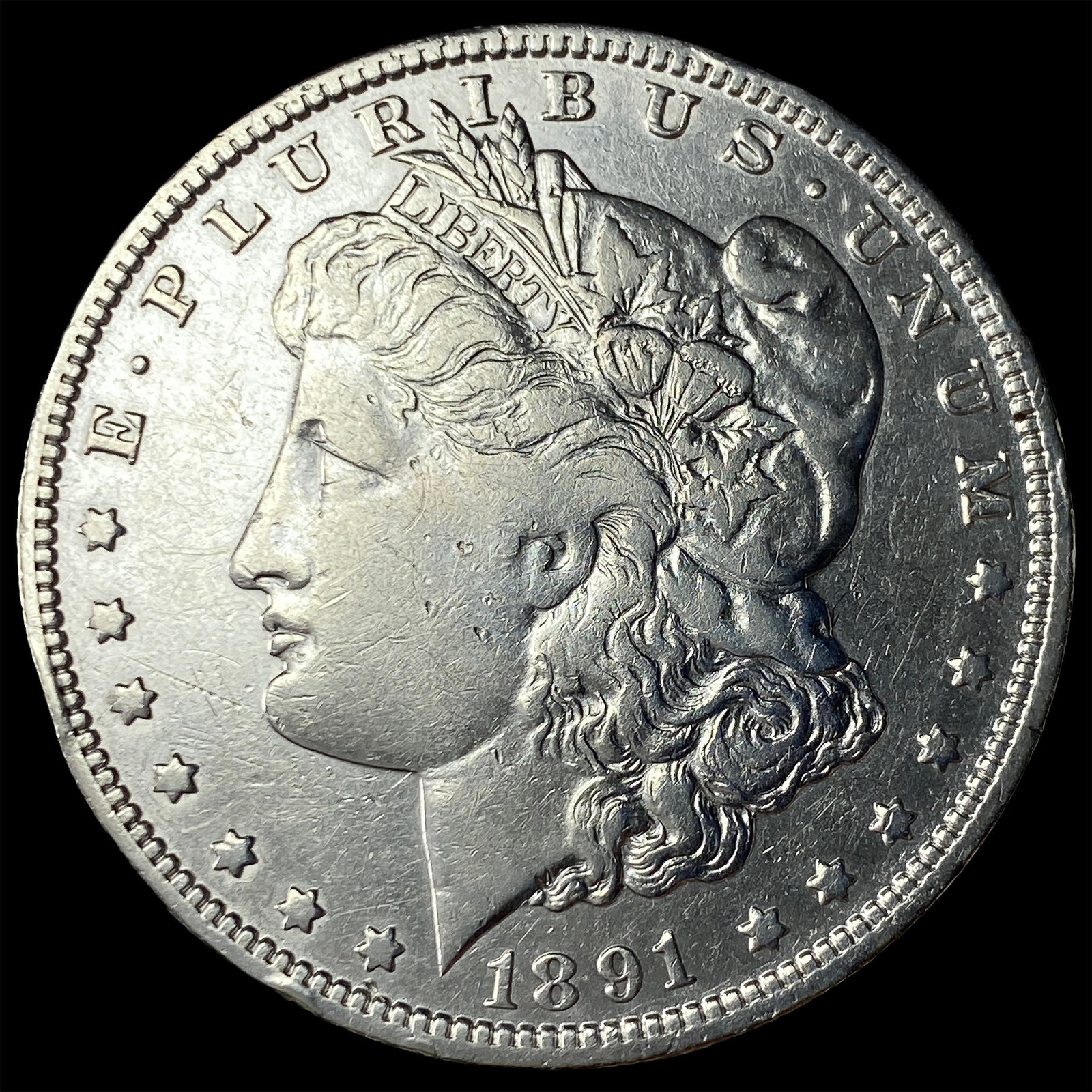 1891-O Silver Morgan Dollar CLOSELY UNCIRCULATED (1 of 2)