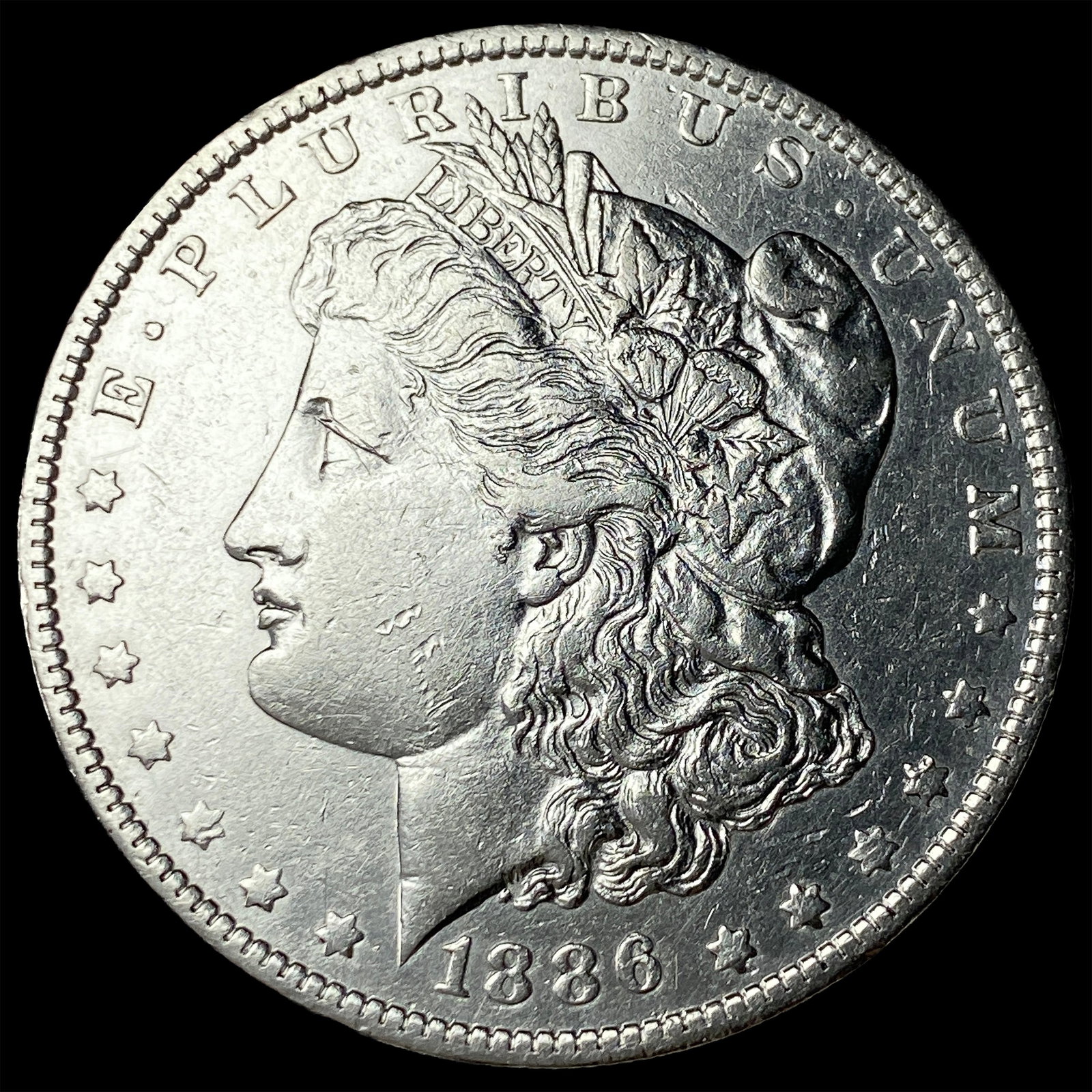 1886-O Silver Morgan Dollar CLOSELY UNCIRCULATED: 1886-O Silver Morgan Dollar CLOSELY UNCIRCULATED