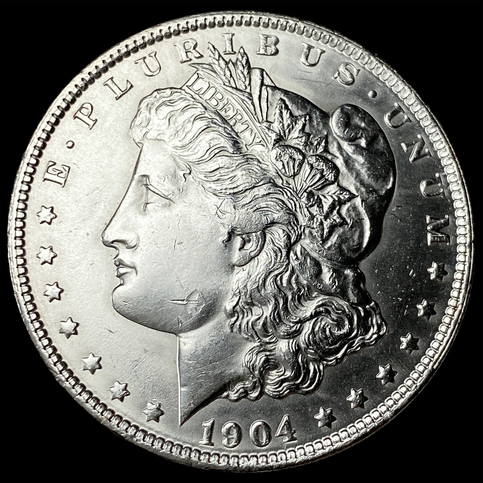 1904-O Morgan Silver Dollar CLOSELY UNCIRCULATED: 1904-O Morgan Silver Dollar CLOSELY UNCIRCULATED