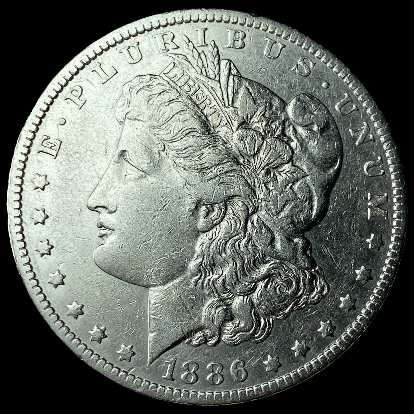 1886-O Silver Morgan Dollar CLOSELY UNCIRCULATED: 1886-O Silver Morgan Dollar CLOSELY UNCIRCULATED