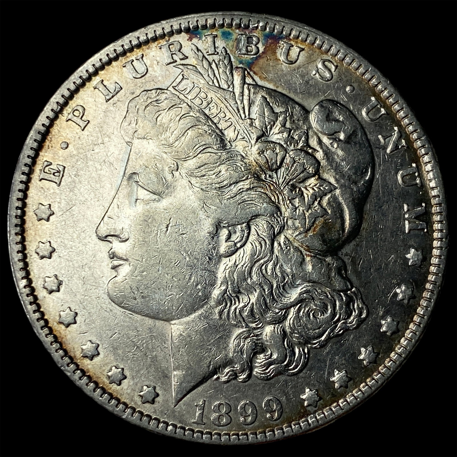 1899 Silver Morgan Dollar CLOSELY UNCIRCULATED (1 of 2)