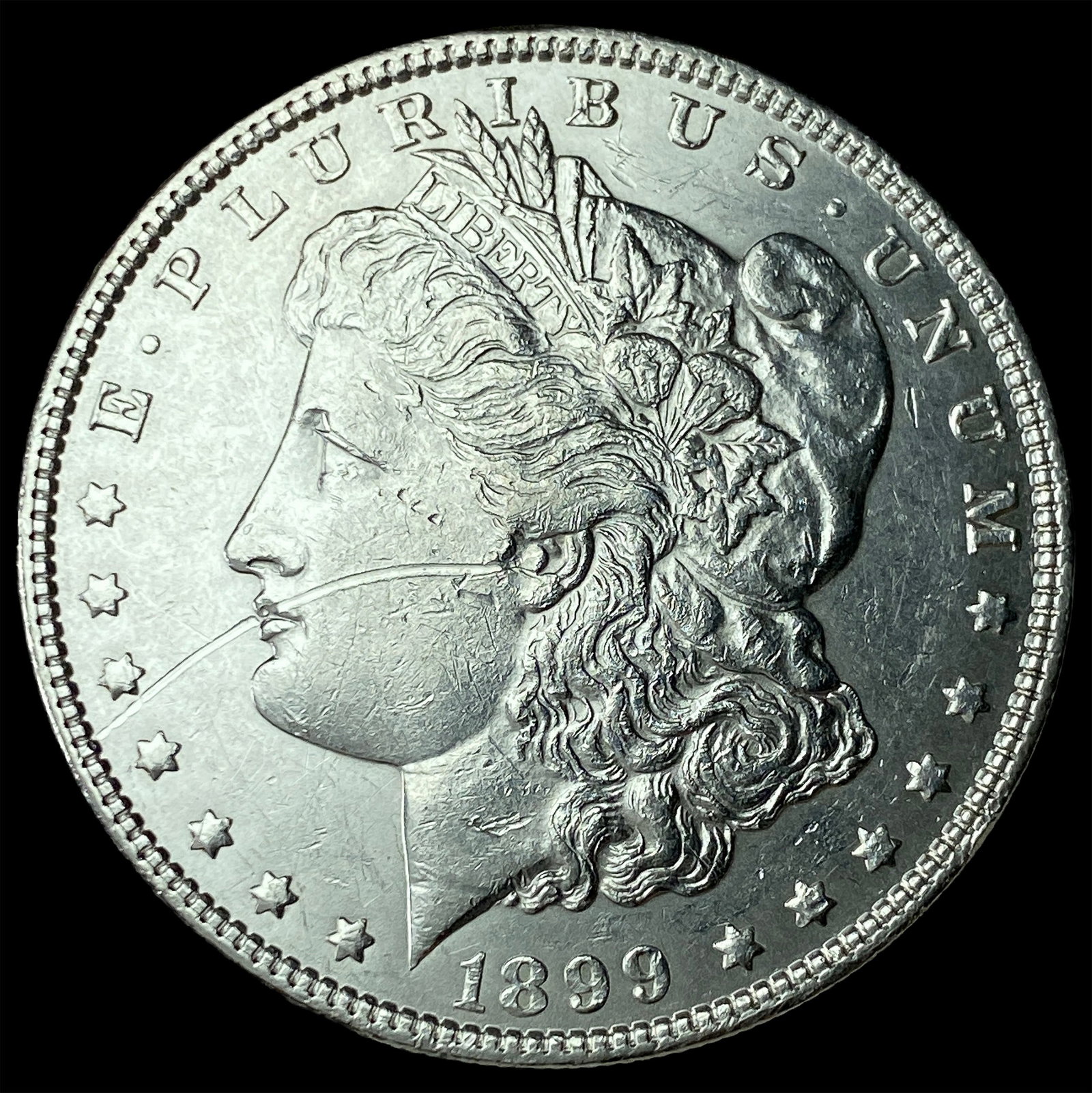 1899 Silver Morgan Dollar HIGH GRADE (1 of 2)