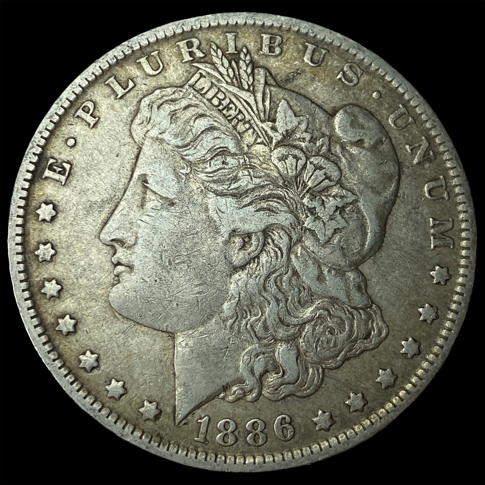 1886-O Silver Morgan Dollar NEARLY UNCIRCULATED: 1886-O Silver Morgan Dollar NEARLY UNCIRCULATED