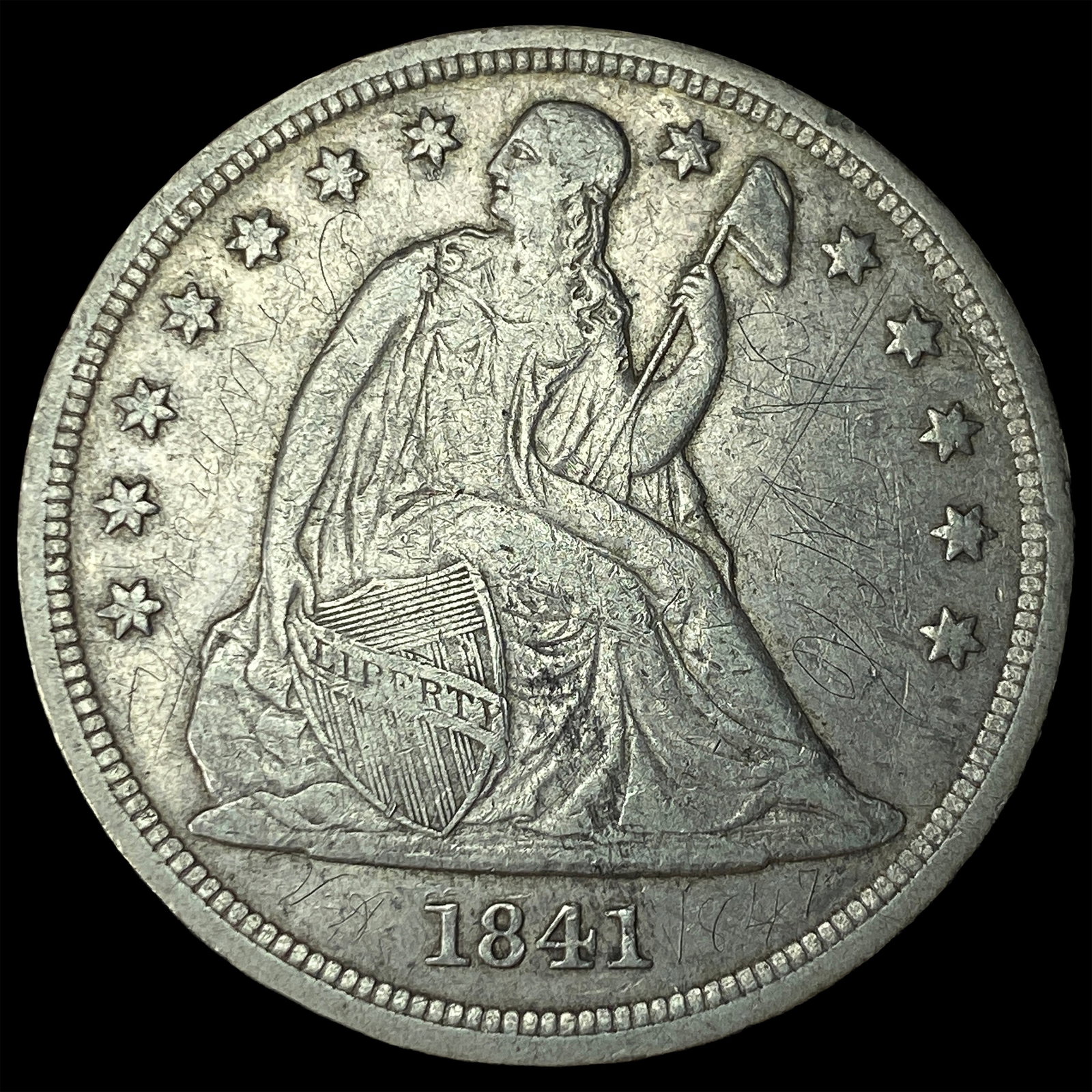 1841 Silver Seated Liberty Dollar NEARLY UNCIRCULATED (1 of 2)