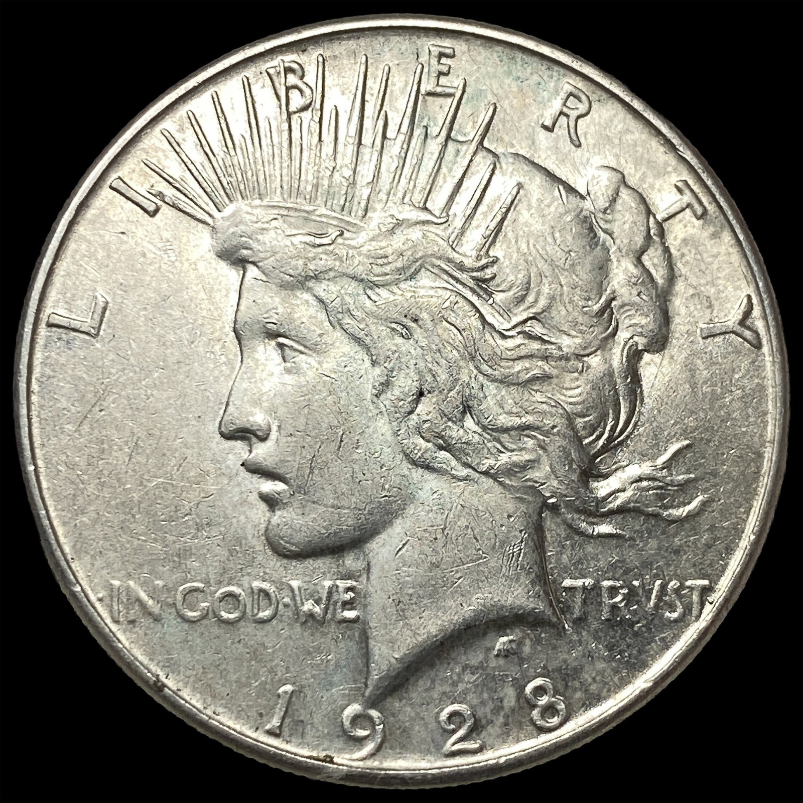 1928 Silver Peace Dollar CLOSELY UNCIRCULATED (1 of 2)