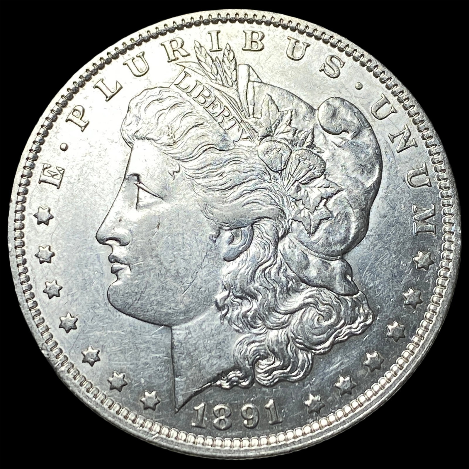 1891-O Silver Morgan Dollar CLOSELY UNCIRCULATED: 1891-O Silver Morgan Dollar CLOSELY UNCIRCULATED