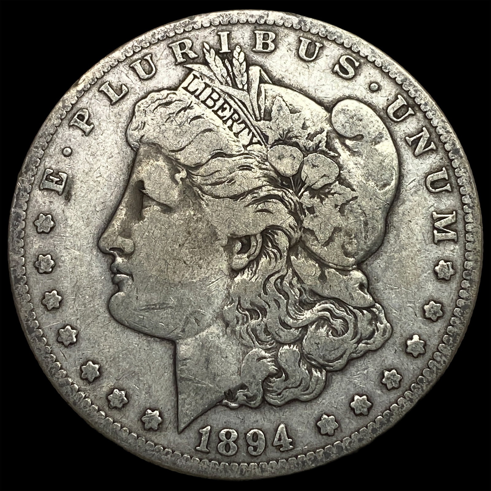 1894-S Silver Morgan Dollar ABOUT UNCIRCULATED: 1894-S Silver Morgan Dollar ABOUT UNCIRCULATED