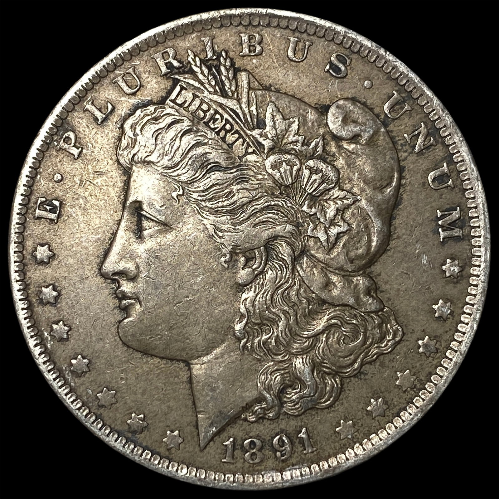 1891-O Silver Morgan Dollar CLOSELY UNCIRCULATED: 1891-O Silver Morgan Dollar CLOSELY UNCIRCULATED