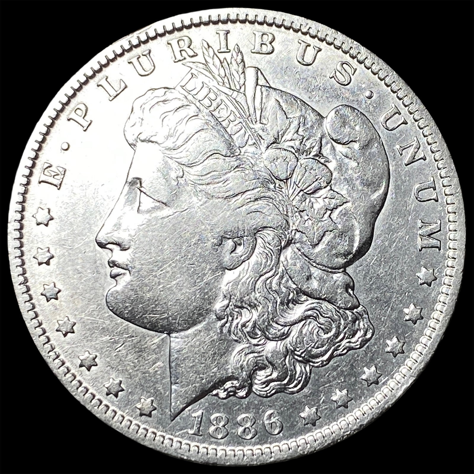 1886-O Silver Morgan Dollar CLOSELY UNCIRCULATED: 1886-O Silver Morgan Dollar CLOSELY UNCIRCULATED