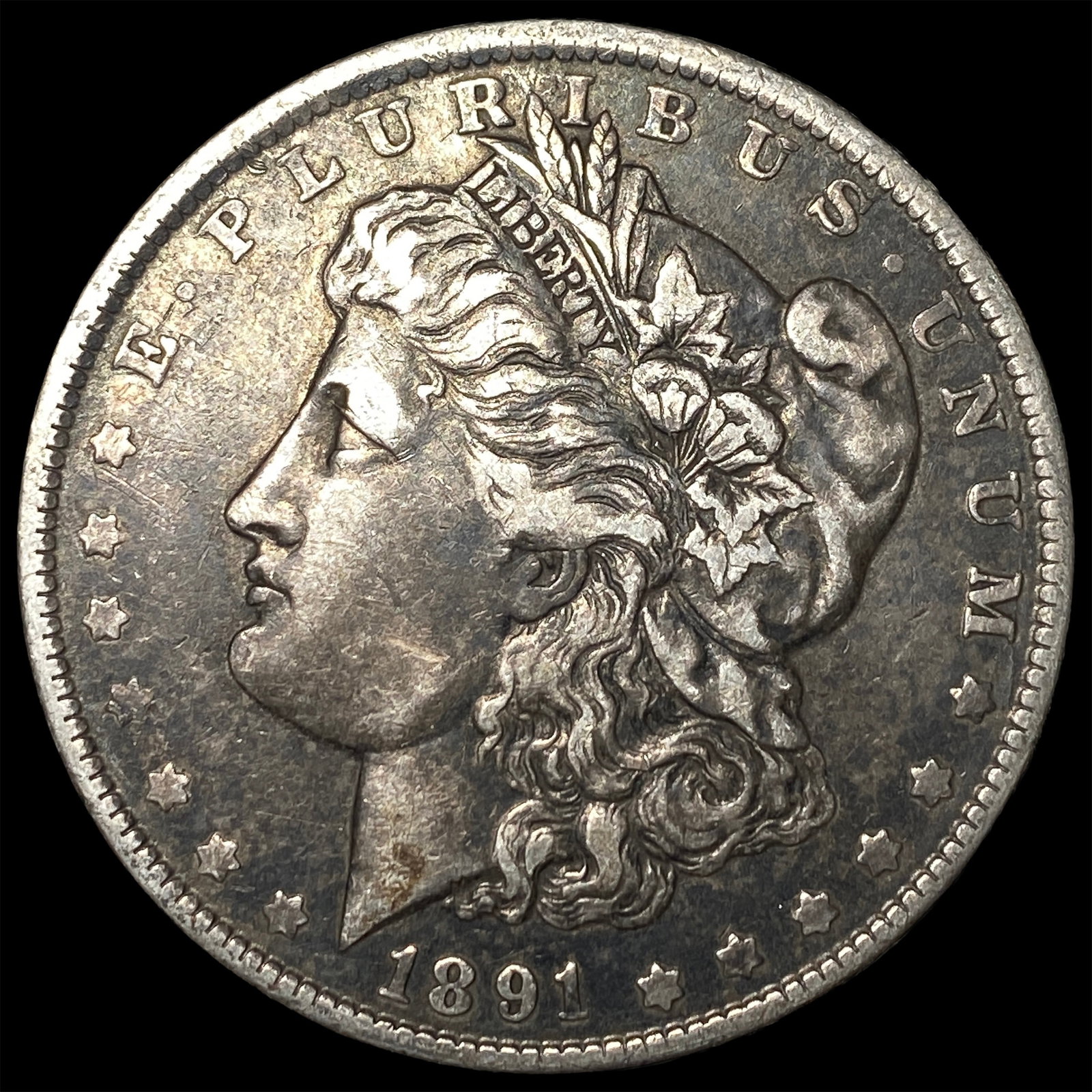 1891-O Silver Morgan Dollar NEARLY UNCIRCULATED (1 of 2)