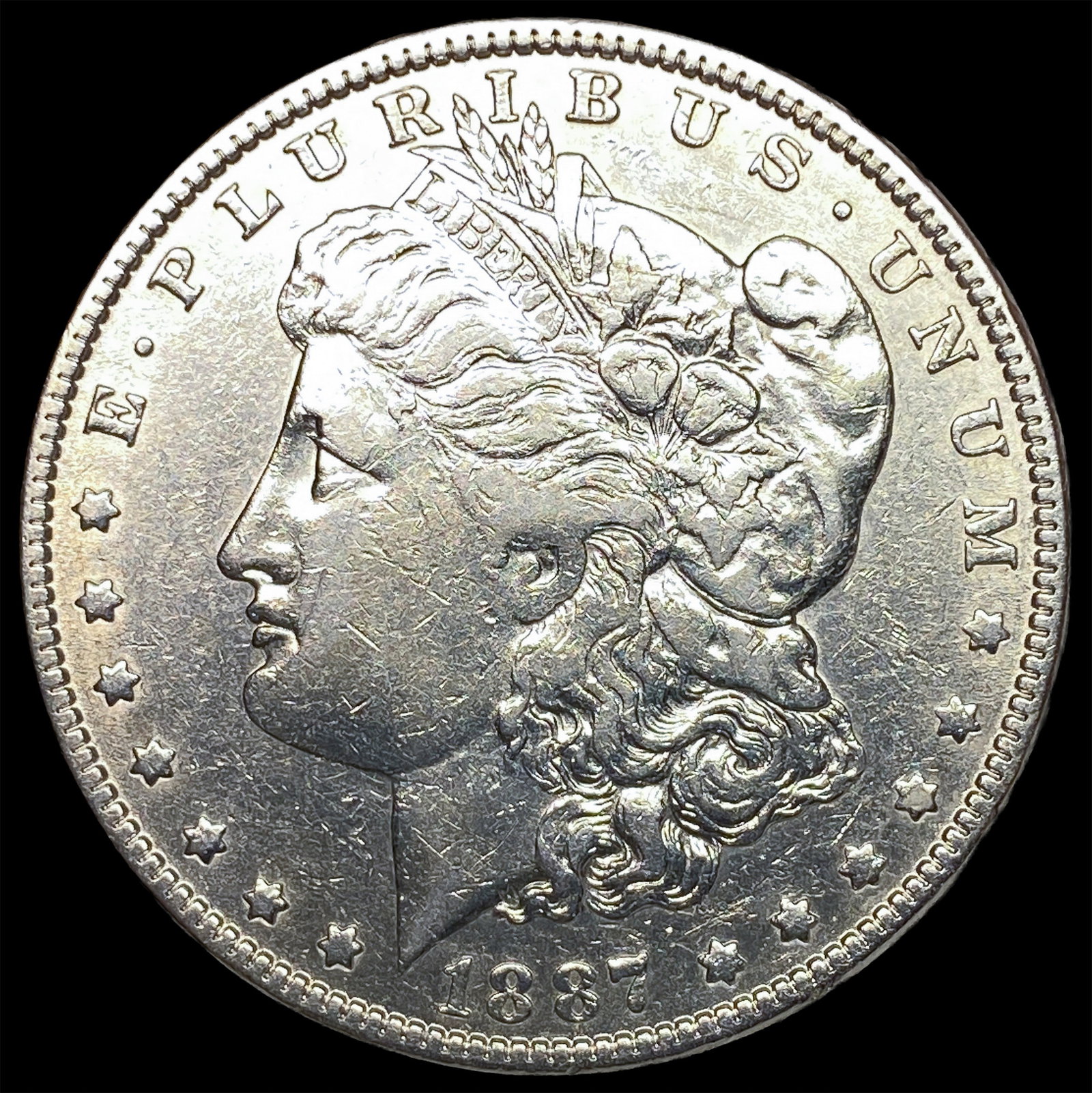 1887 Morgan Silver Dollar NEARLY UNCIRCULATED (1 of 2)