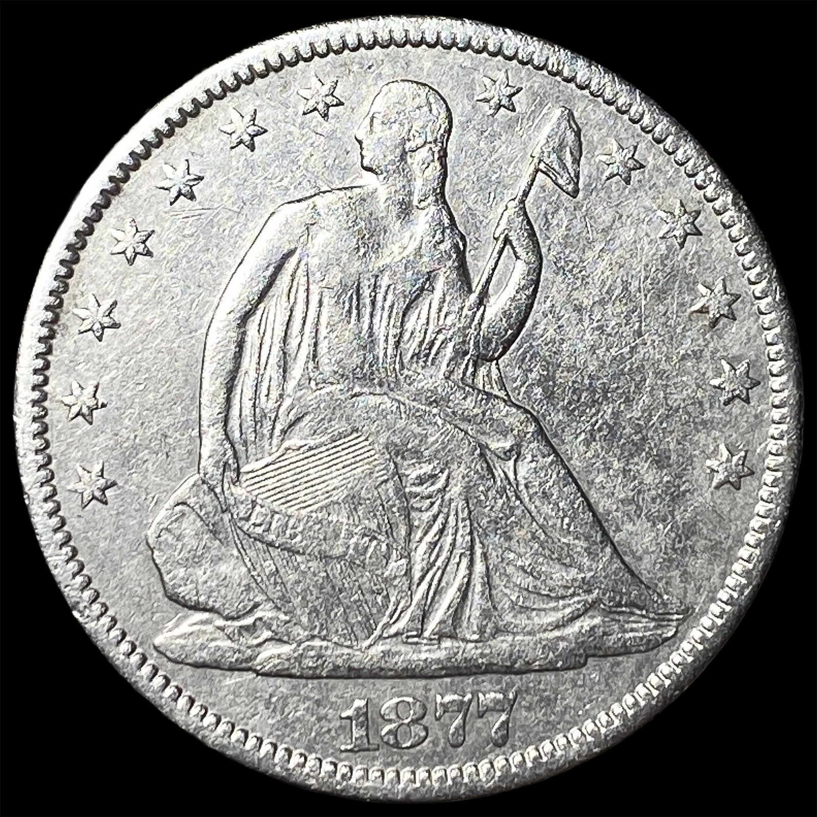 1877-CC Silver Seated Liberty Half Dollar CLOSELY UNCIRCULATED (1 of 2)