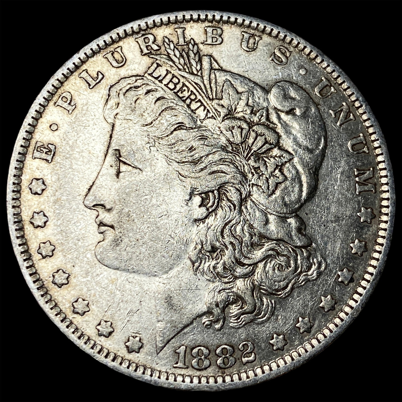 1882-O/S Silver Morgan Dollar NEARLY UNCIRCULATED (1 of 2)