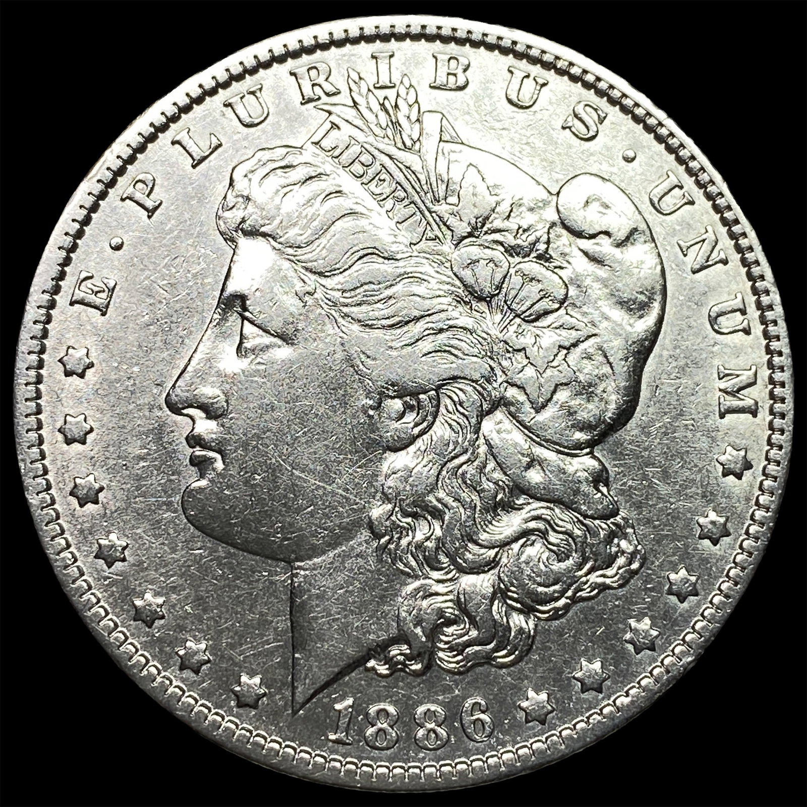 1886-O Silver Morgan Dollar CLOSELY UNCIRCULATED: 1886-O Silver Morgan Dollar CLOSELY UNCIRCULATED