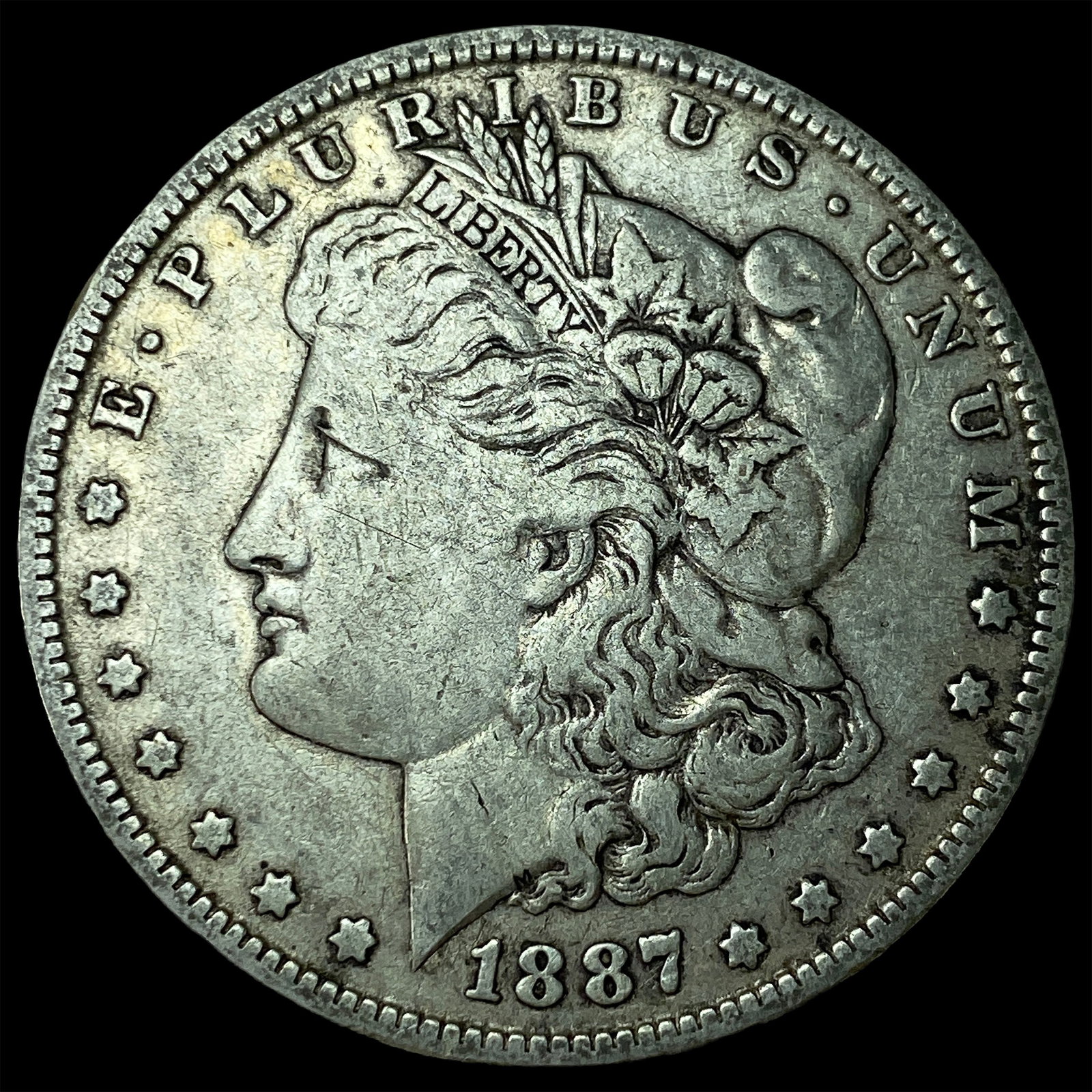 1887-O Silver Morgan Dollar CLOSELY UNCIRCULATED: 1887-O Silver Morgan Dollar CLOSELY UNCIRCULATED