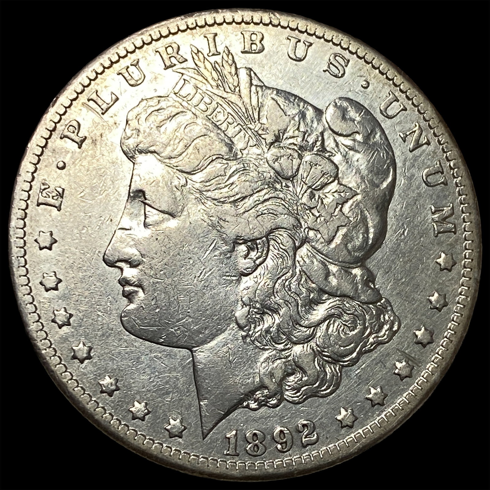 1892-CC Silver Morgan Dollar NEARLY UNCIRCULATED (1 of 2)