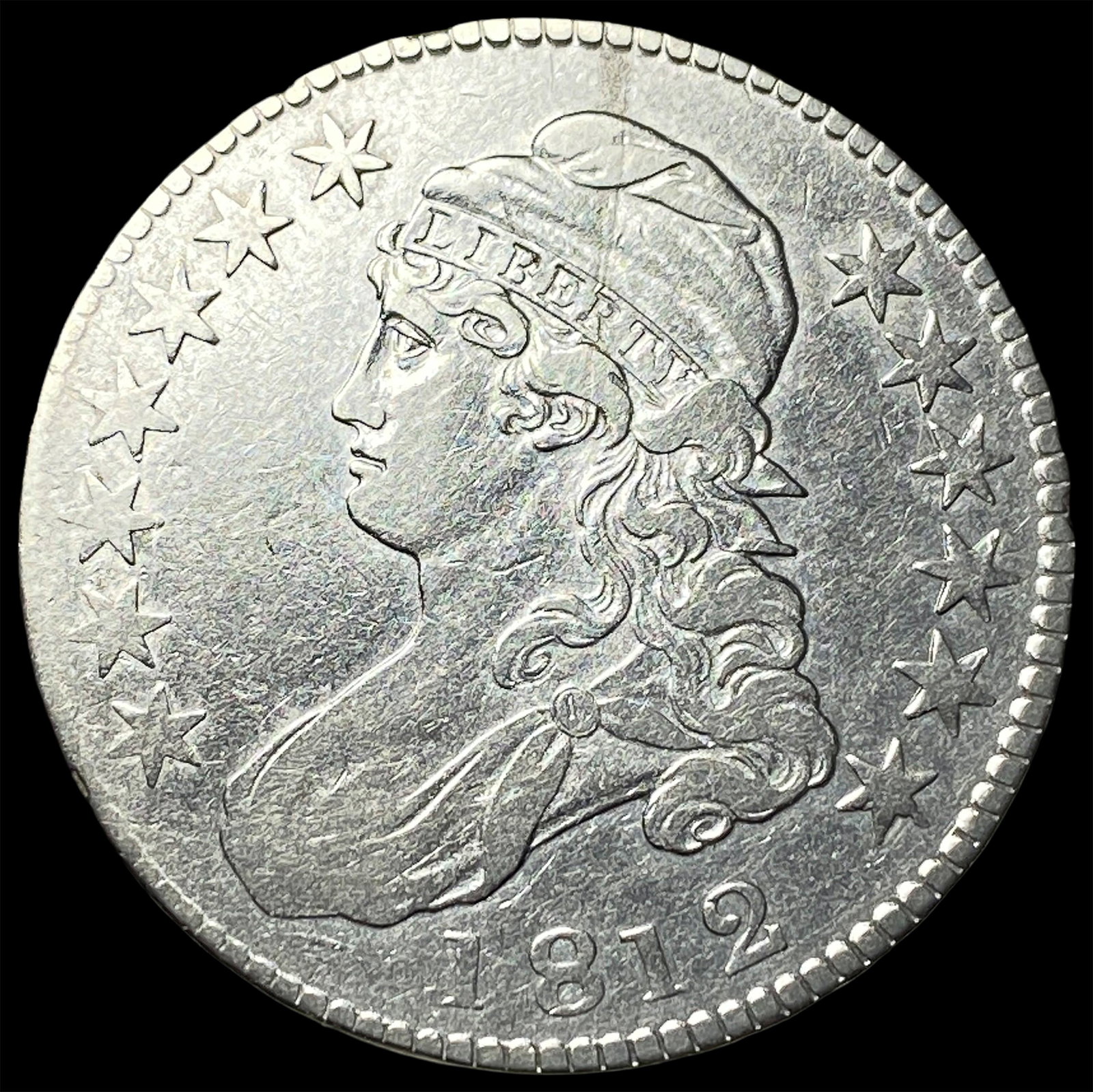 1812 Capped Bust Half Dollar NEARLY UNCIRCULATED (1 of 2)