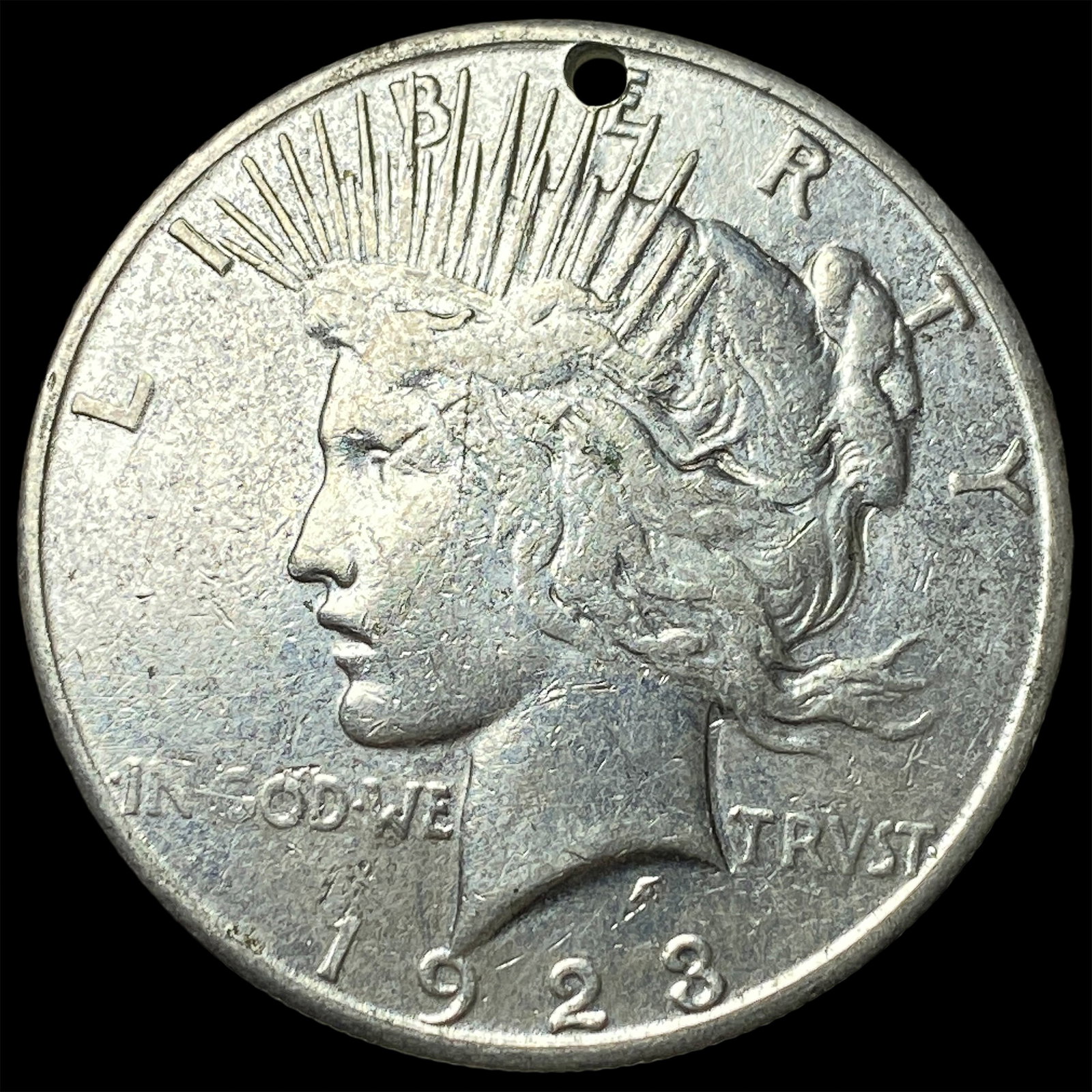 1923 Silver Peace Dollar (holed) LIGHTLY CIRCULATED