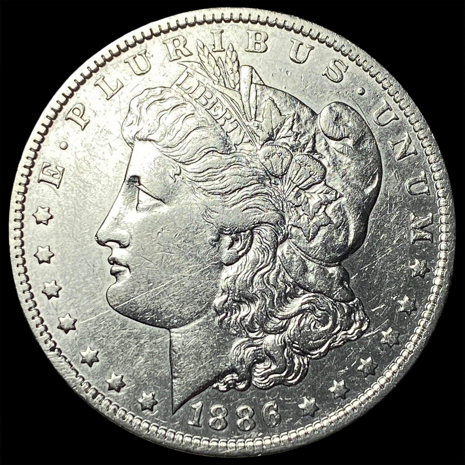 1886-O Silver Morgan Dollar CLOSELY UNCIRCULATED: 1886-O Silver Morgan Dollar CLOSELY UNCIRCULATED
