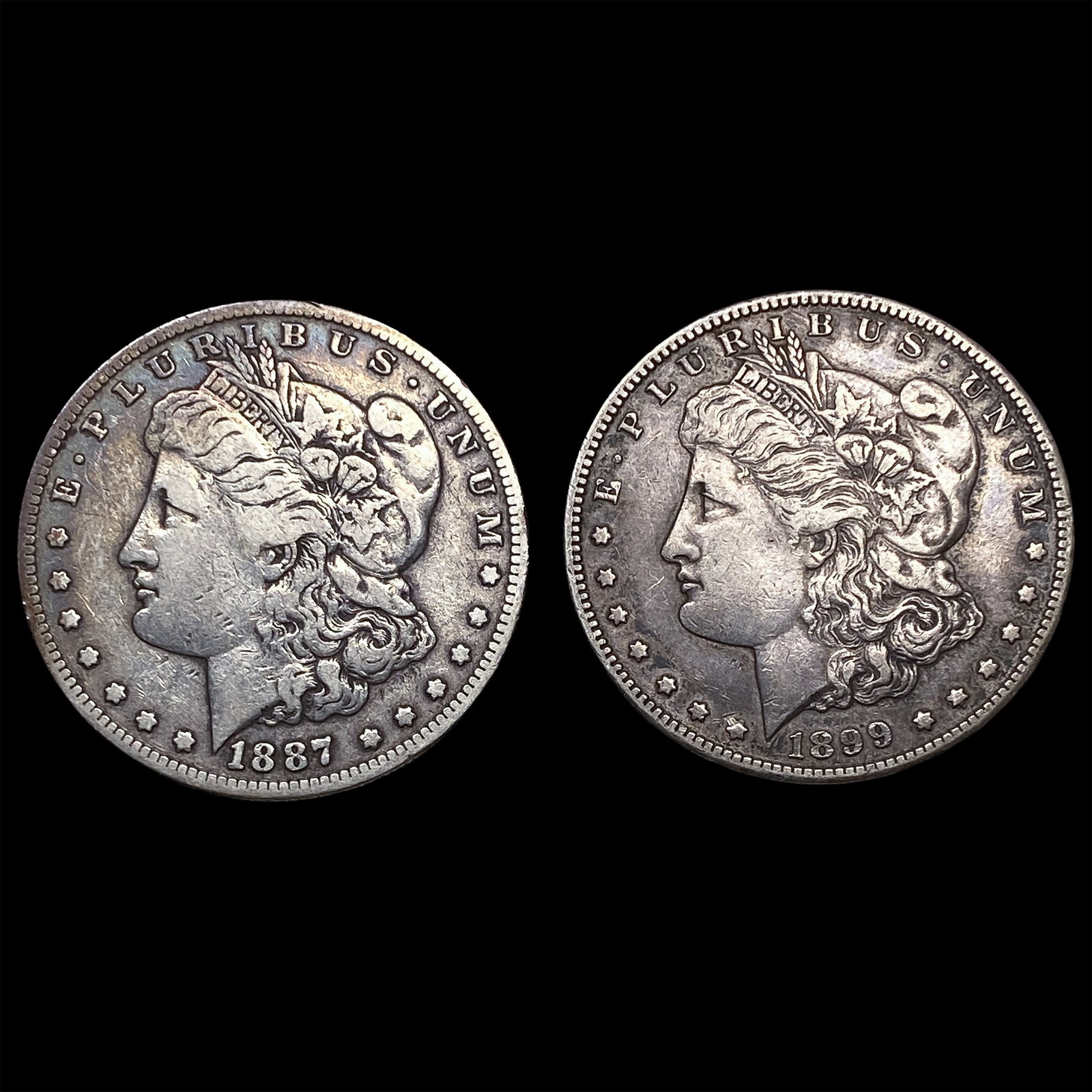 1887 Silver Morgan Dollar and 1899 Silver Morgan Dollar NEARLY UNCIRCULATED (1 of 2)