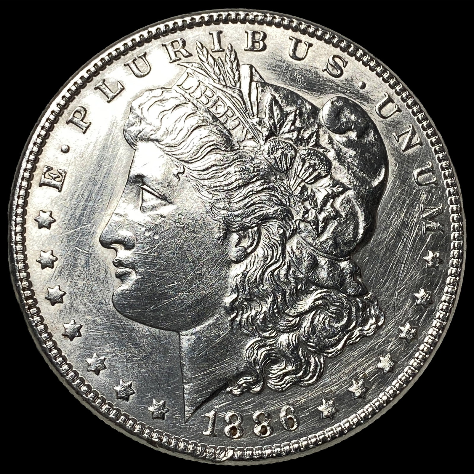 1886 Silver Morgan Dollar CLOSELY UNCIRCULATED: 1886 Silver Morgan Dollar CLOSELY UNCIRCULATED