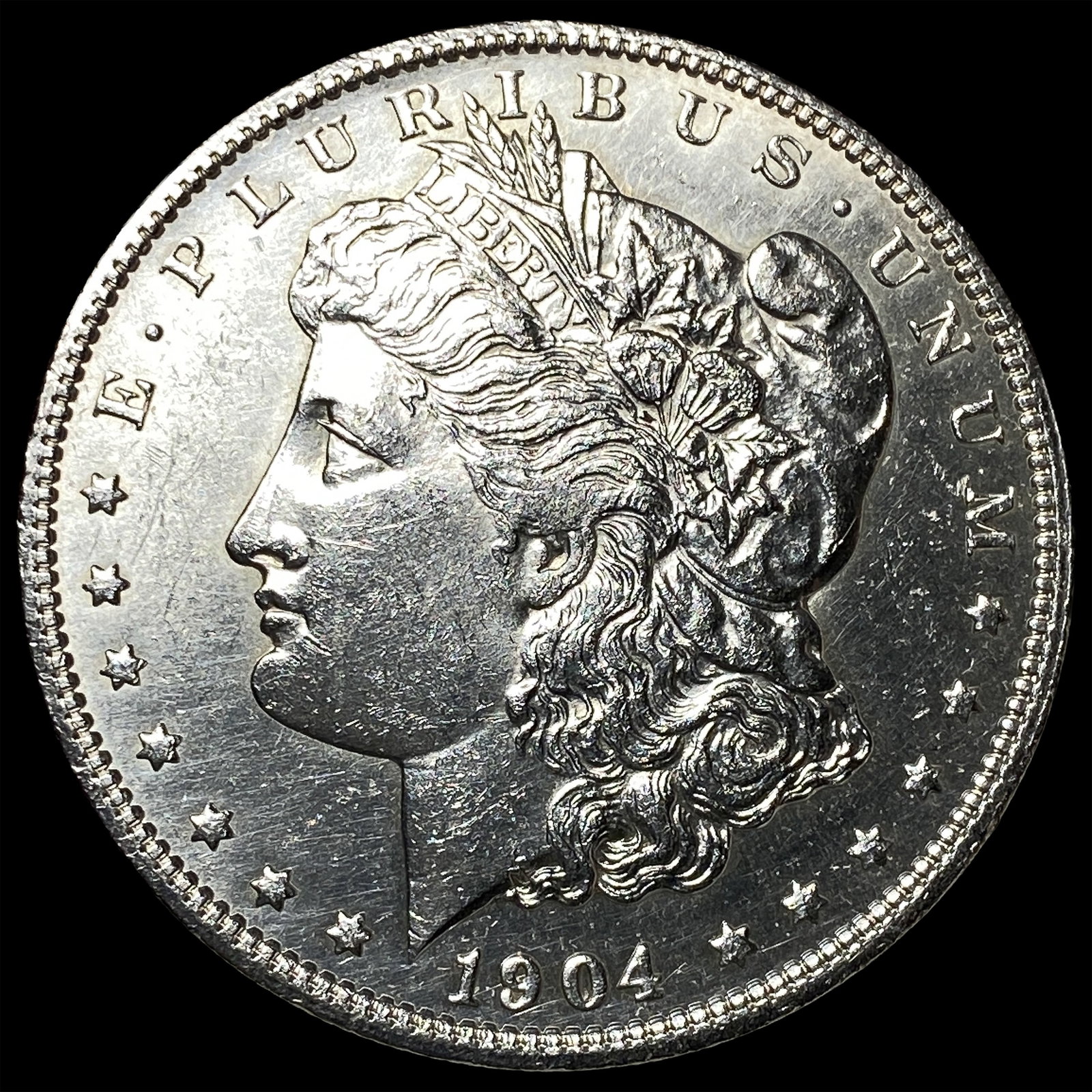 1904-O Silver Morgan Dollar ABOUT UNCIRCULATED: 1904-O Silver Morgan Dollar ABOUT UNCIRCULATED