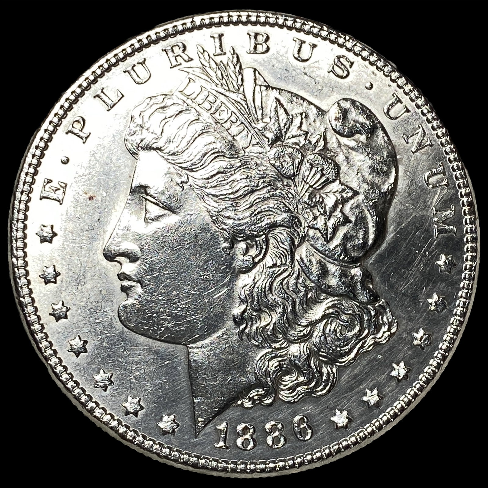 1886 Silver Morgan Dollar CLOSELY UNCIRCULATED: 1886 Silver Morgan Dollar CLOSELY UNCIRCULATED