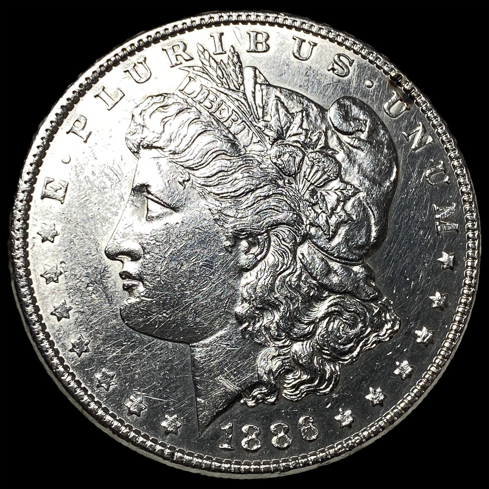 1886 Morgan Silver Dollar CLOSELY UNCIRCULATED: 1886 Morgan Silver Dollar CLOSELY UNCIRCULATED