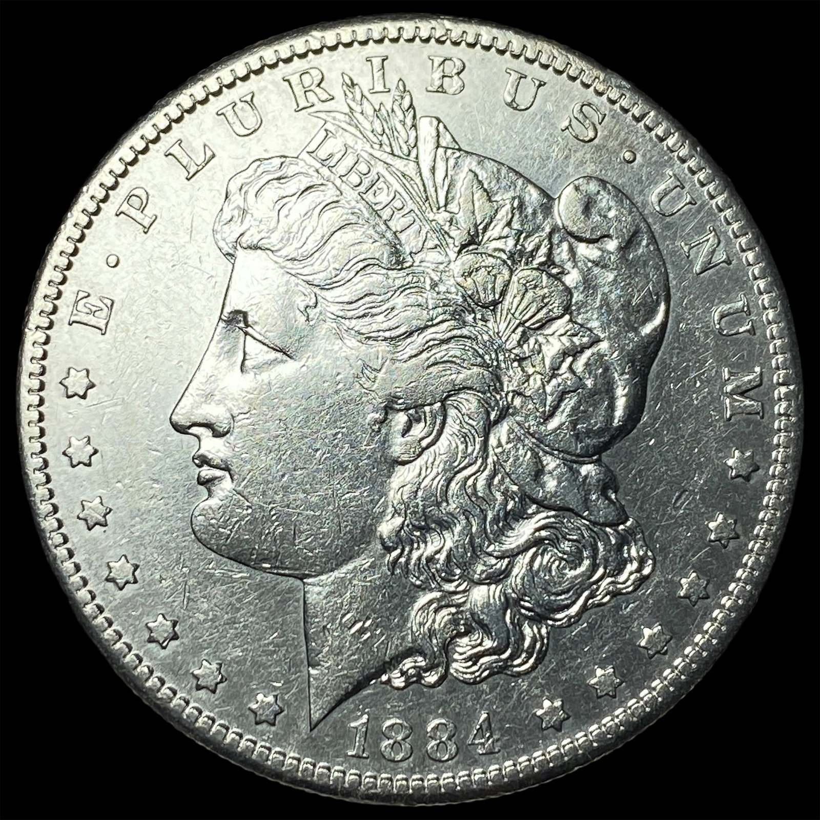 1884 Silver Morgan Dollar CLOSELY UNCIRCULATED: 1884 Silver Morgan Dollar CLOSELY UNCIRCULATED