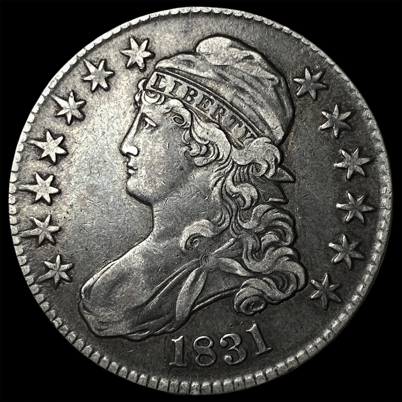 1831 Capped Bust Half Dollar NEARLY UNCIRCULATED (1 of 2)