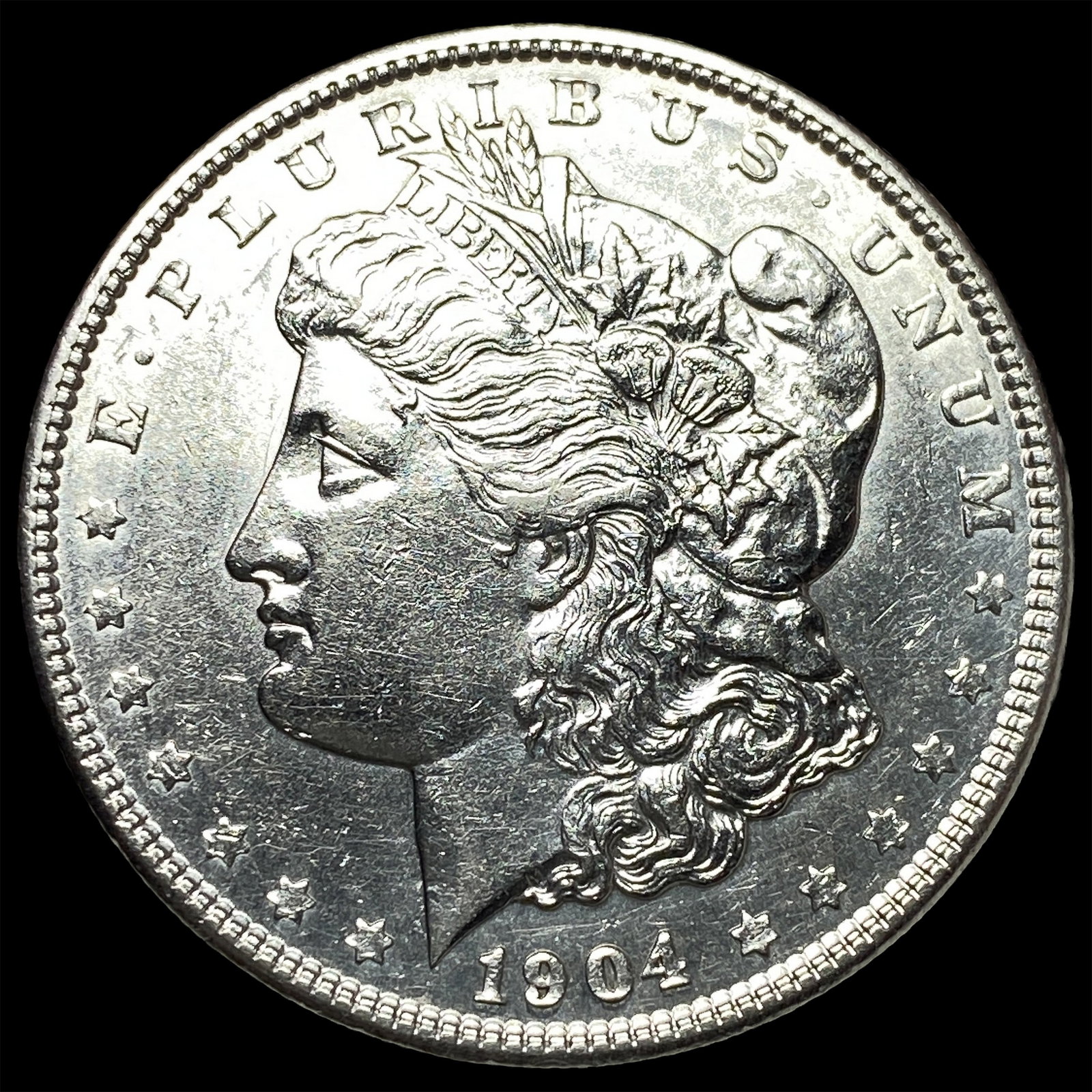 1904 Silver Morgan Dollar ABOUT UNCIRCULATED: 1904 Silver Morgan Dollar ABOUT UNCIRCULATED
