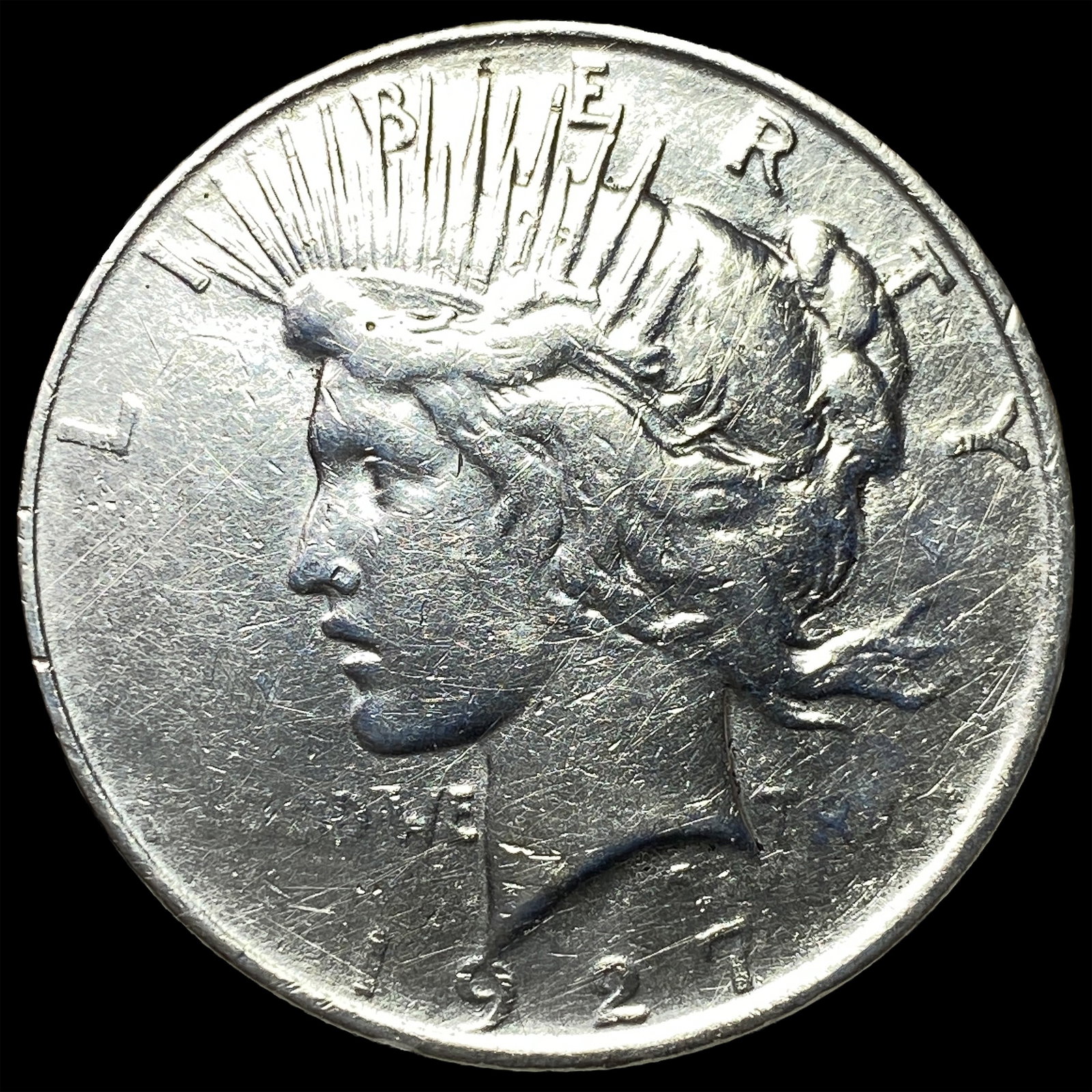 1927-D Peace Silver Dollar NEARLY UNCIRCULATED: 1927-D Peace Silver Dollar NEARLY UNCIRCULATED