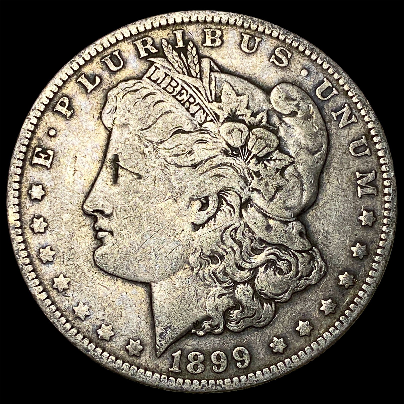 1899-O Micro O Morgan Silver Dollar ABOUT UNCIRCULATED: 1899-O Micro O Morgan Silver Dollar ABOUT UNCIRCULATED