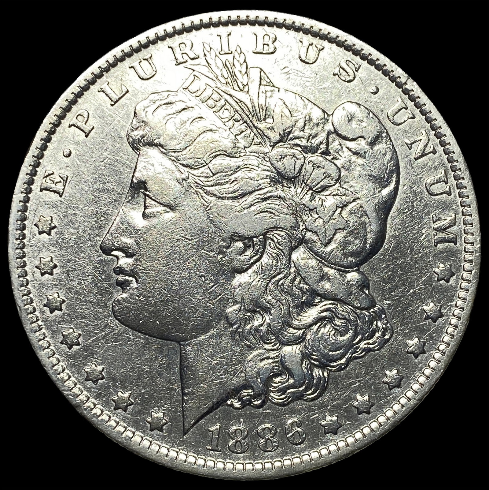 1886-O Silver Morgan Dollar CLOSELY UNCIRCULATED: 1886-O Silver Morgan Dollar CLOSELY UNCIRCULATED