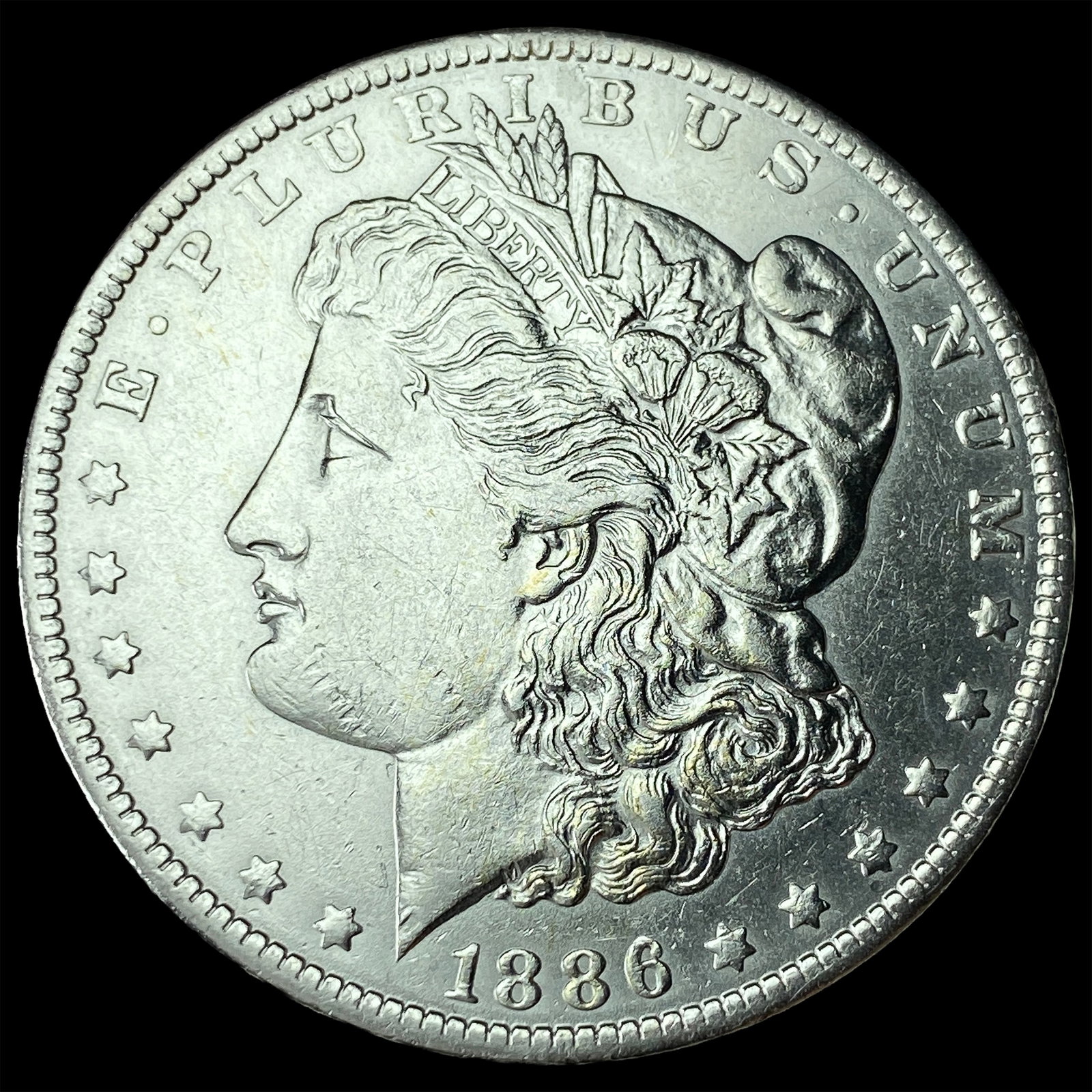 1886-O Silver Morgan Dollar NEARLY UNCIRCULATED: 1886-O Silver Morgan Dollar NEARLY UNCIRCULATED