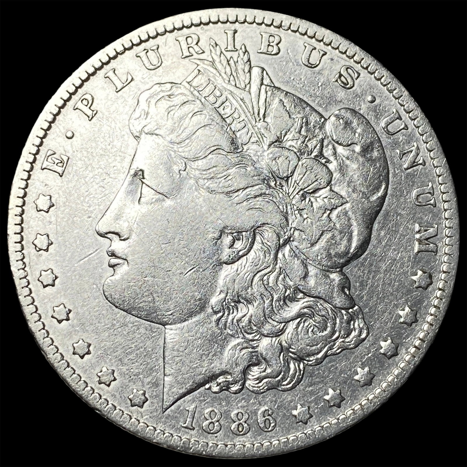 1886-O Silver Morgan Dollar CLOSELY UNCIRCULATED: 1886-O Silver Morgan Dollar CLOSELY UNCIRCULATED