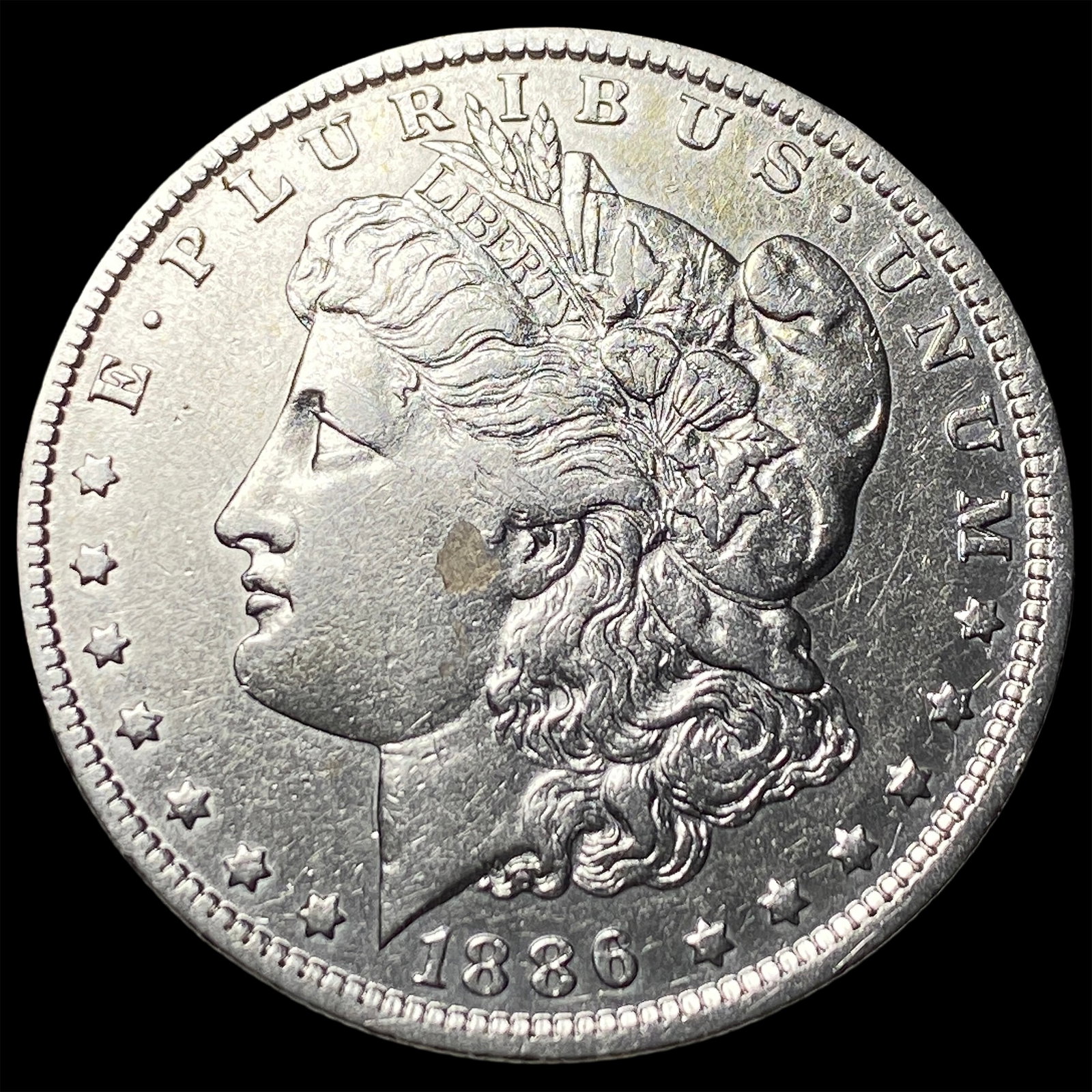 1886 Silver Morgan Dollar CLOSELY UNCIRCULATED: 1886 Silver Morgan Dollar CLOSELY UNCIRCULATED