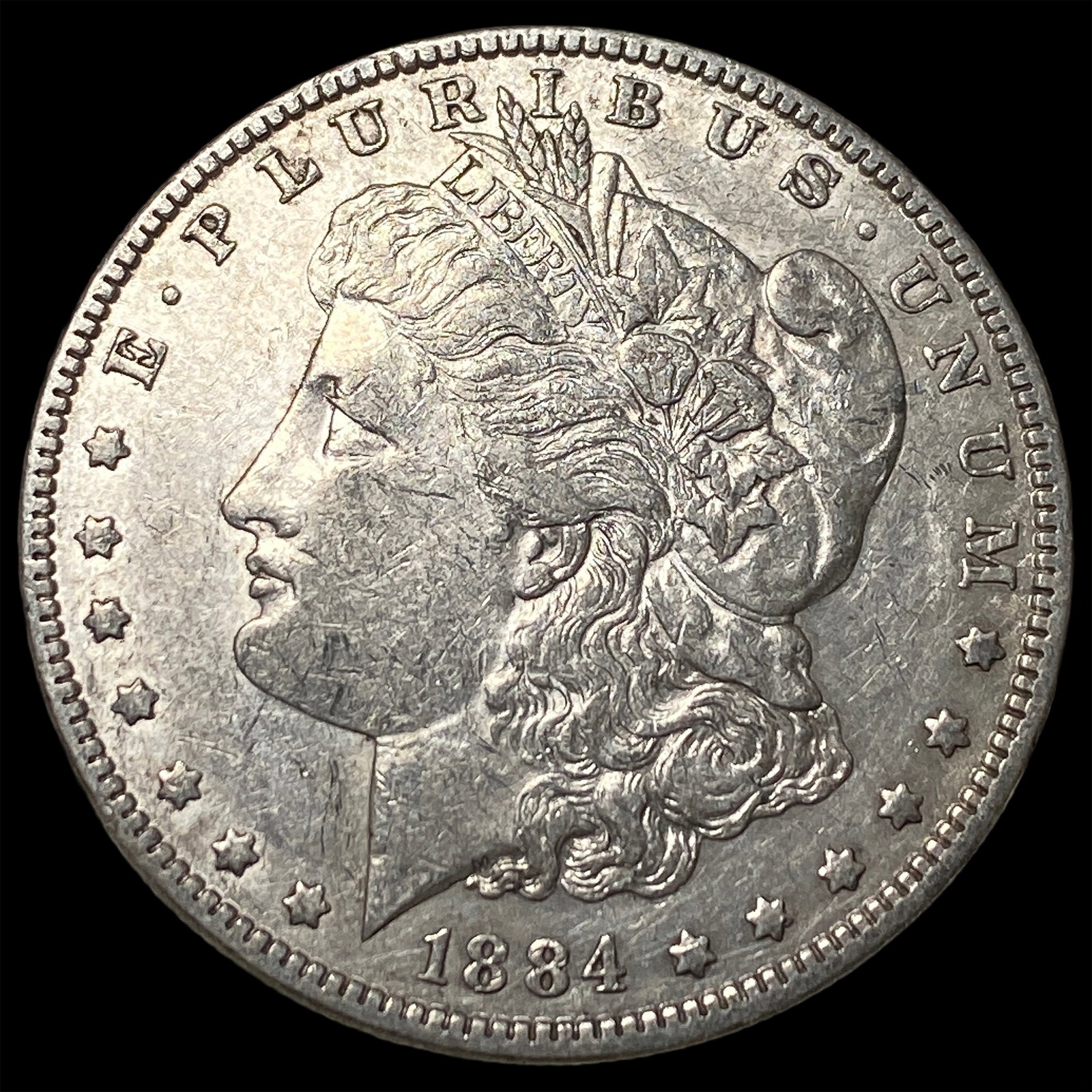 1884 Silver Morgan Dollar CLOSELY UNCIRCULATED: 1884 Silver Morgan Dollar CLOSELY UNCIRCULATED