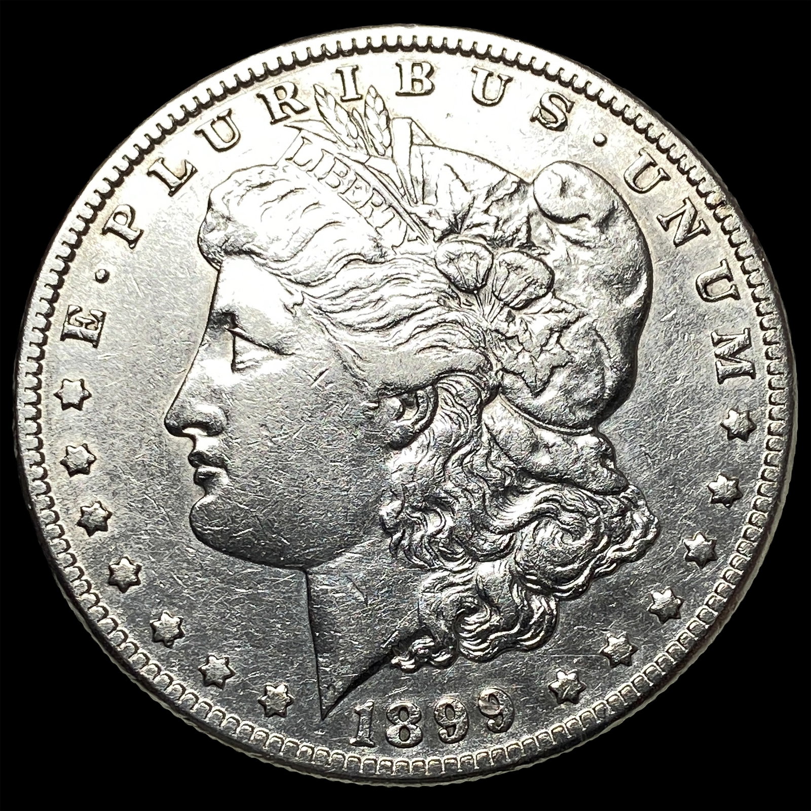 1899-O Silver Morgan Dollar CLOSELY UNCIRCULATED: 1899-O Silver Morgan Dollar CLOSELY UNCIRCULATED