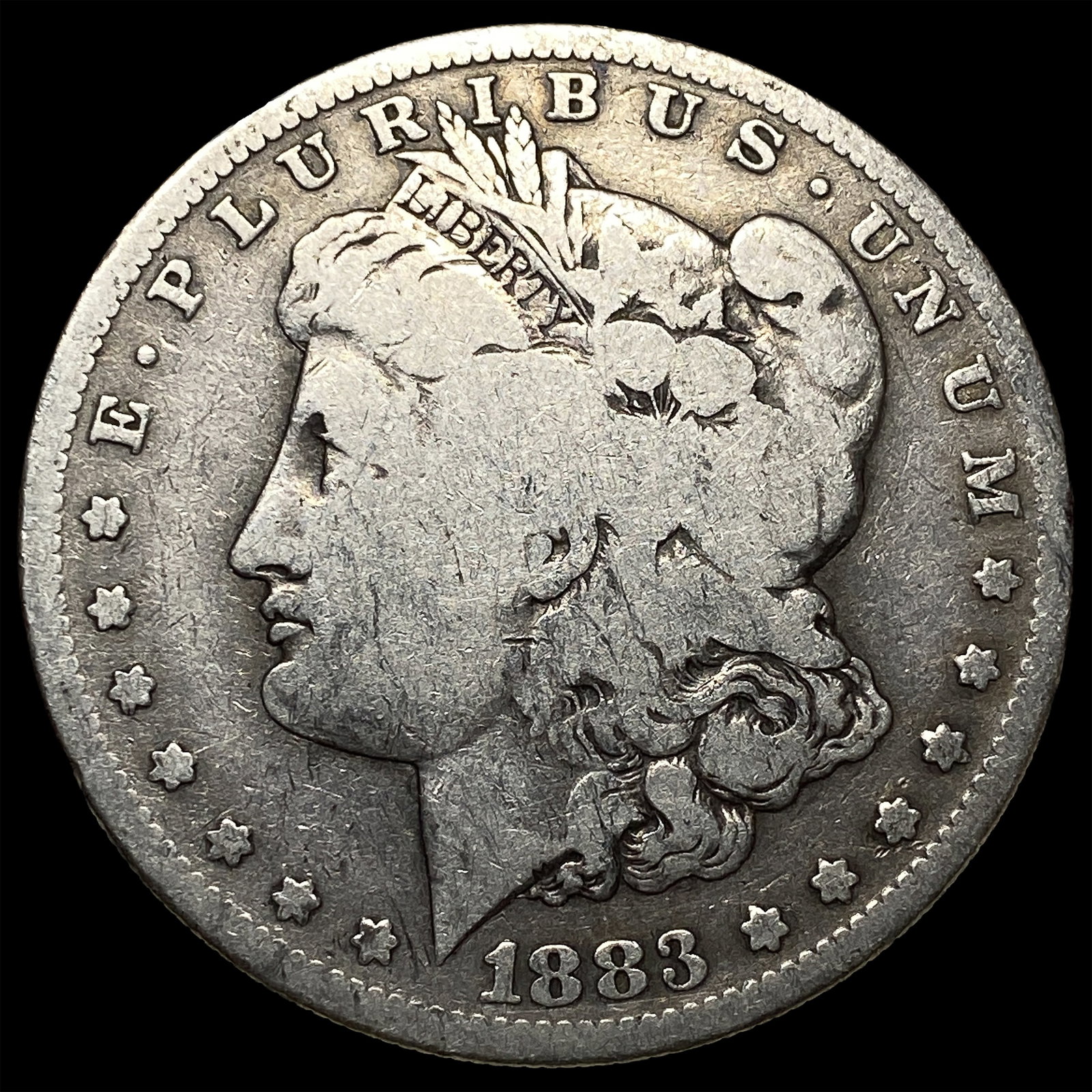 1883-S Silver Morgan Dollar ABOUT UNCIRCULATED: 1883-S Silver Morgan Dollar ABOUT UNCIRCULATED