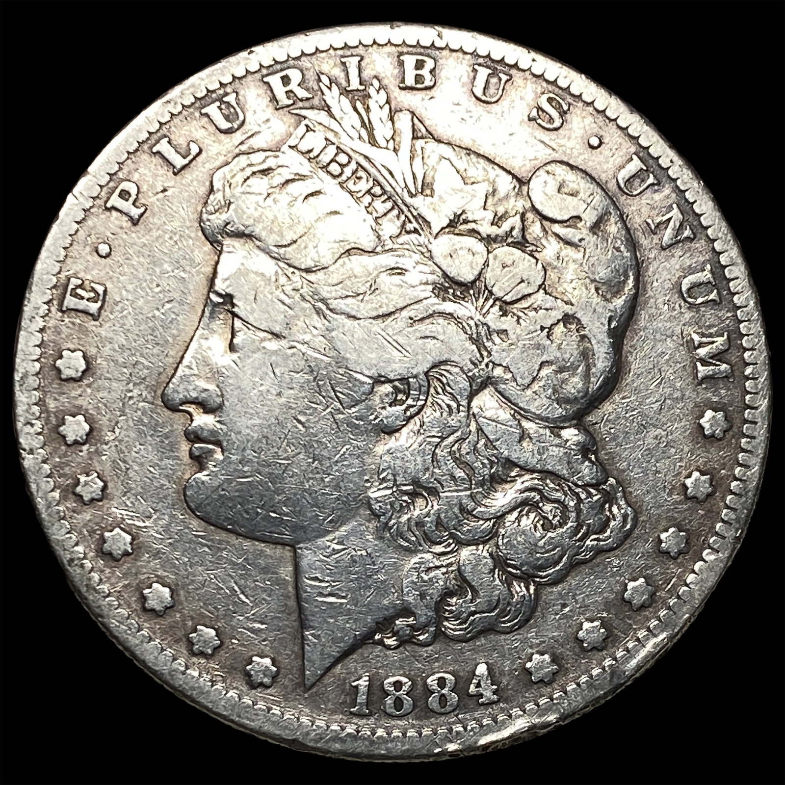 1884-S Silver Morgan Dollar ABOUT UNCIRCULATED: 1884-S Silver Morgan Dollar ABOUT UNCIRCULATED