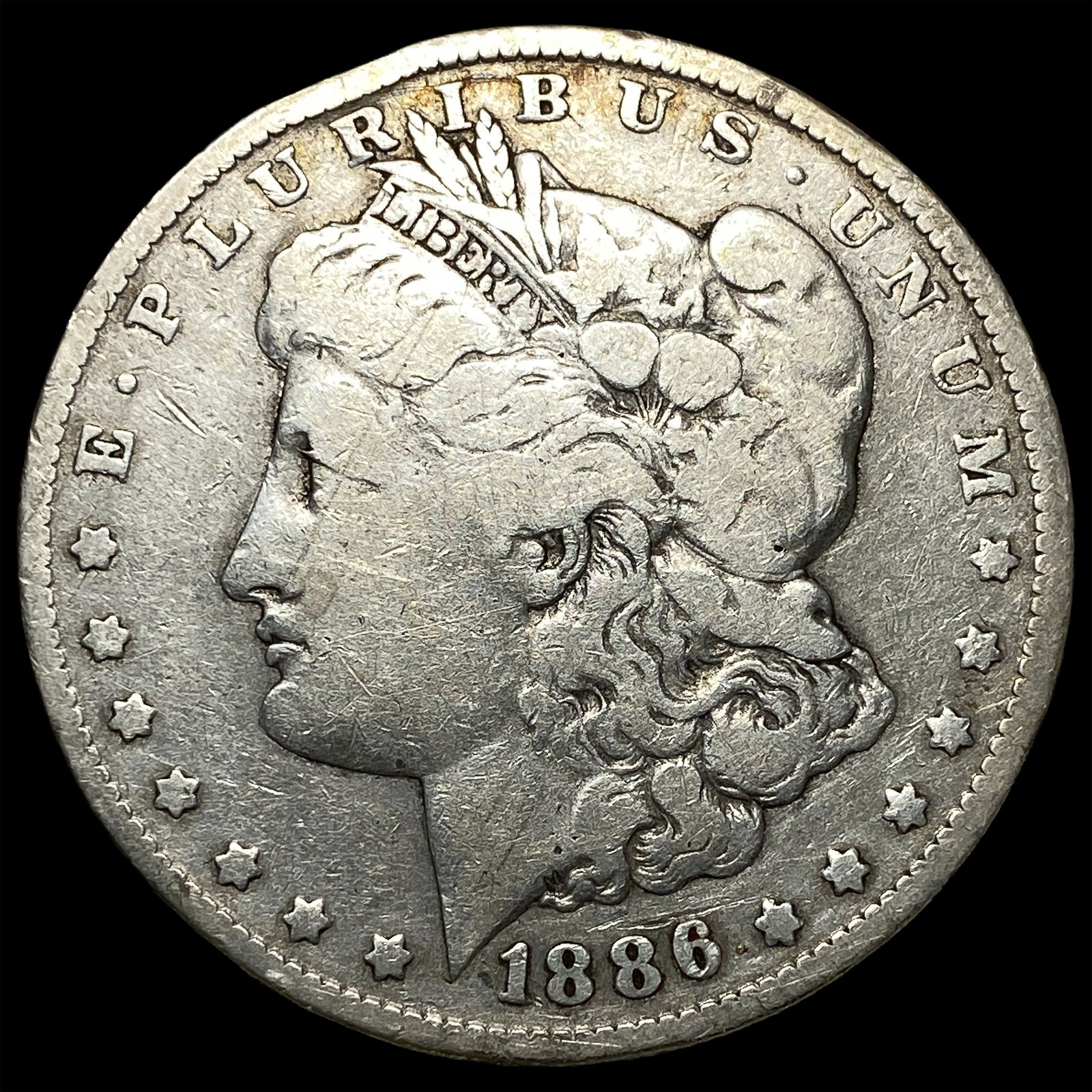 1886-O Silver Morgan Dollar ABOUT UNCIRCULATED: 1886-O Silver Morgan Dollar ABOUT UNCIRCULATED