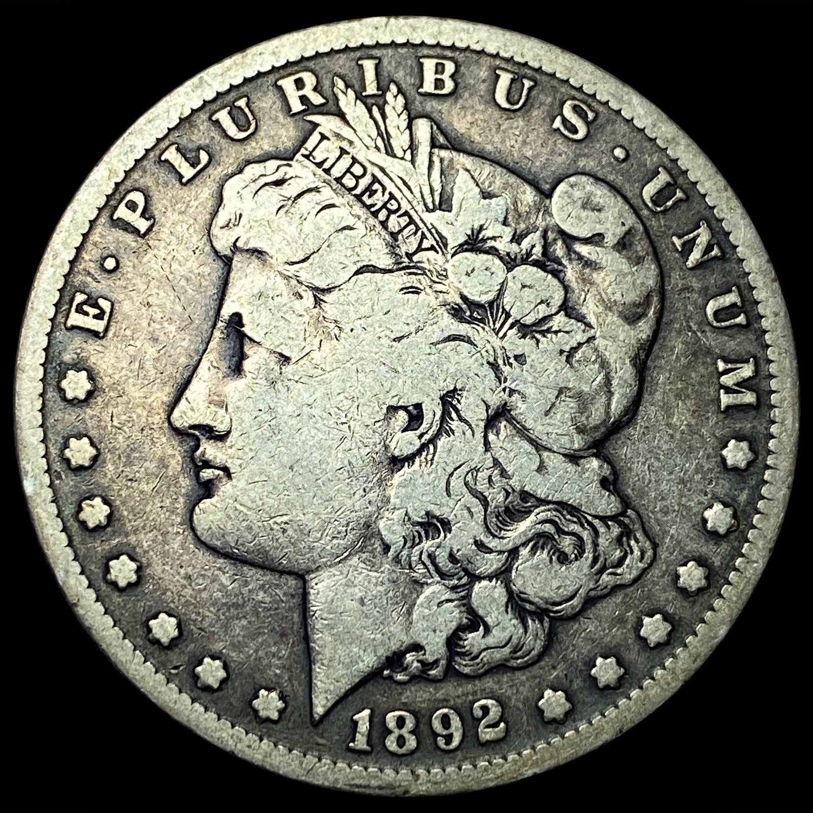 1892-S Silver Morgan Dollar ABOUT UNCIRCULATED: 1892-S Silver Morgan Dollar ABOUT UNCIRCULATED
