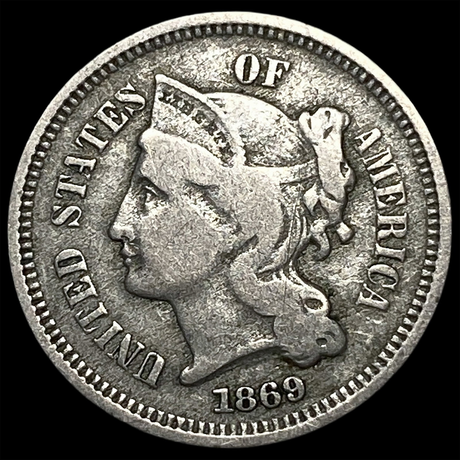 1869 Nickel Three-Cent Piece ABOUT UNCIRCULATED: 1869 Nickel Three-Cent Piece ABOUT UNCIRCULATED