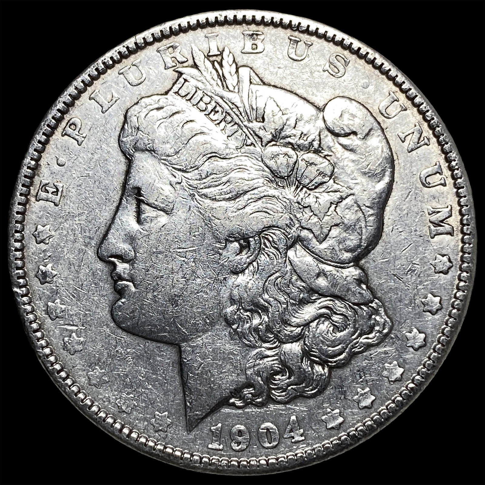 1904-O Silver Morgan Dollar NEARLY UNCIRCULATED: 1904-O Silver Morgan Dollar NEARLY UNCIRCULATED